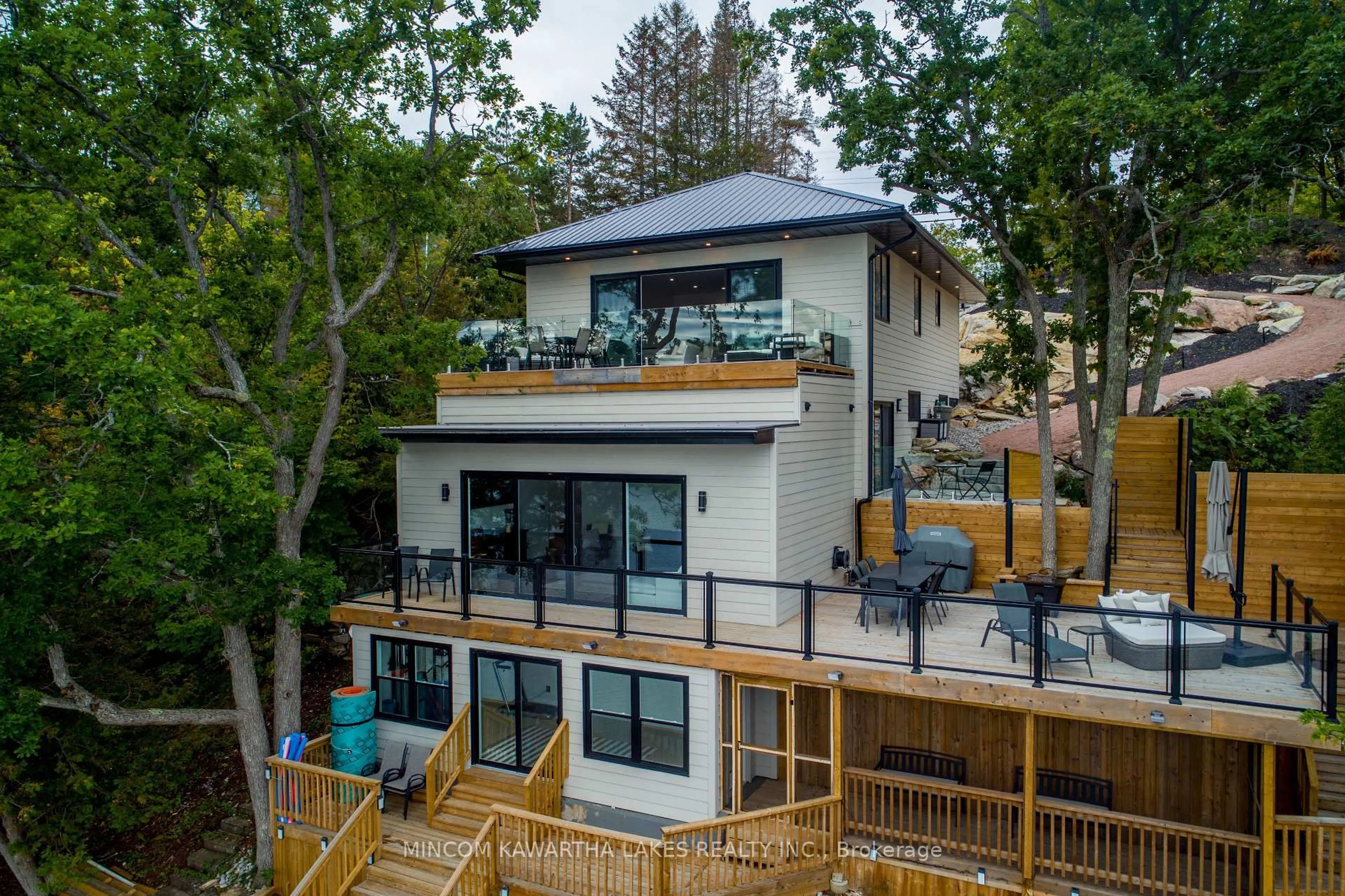 A pic from outside/outdoor area/front of a property/back of a property/a pic from drone, unknown for 1416 Northey's Bay Rd, North Kawartha Ontario K0L 3E0