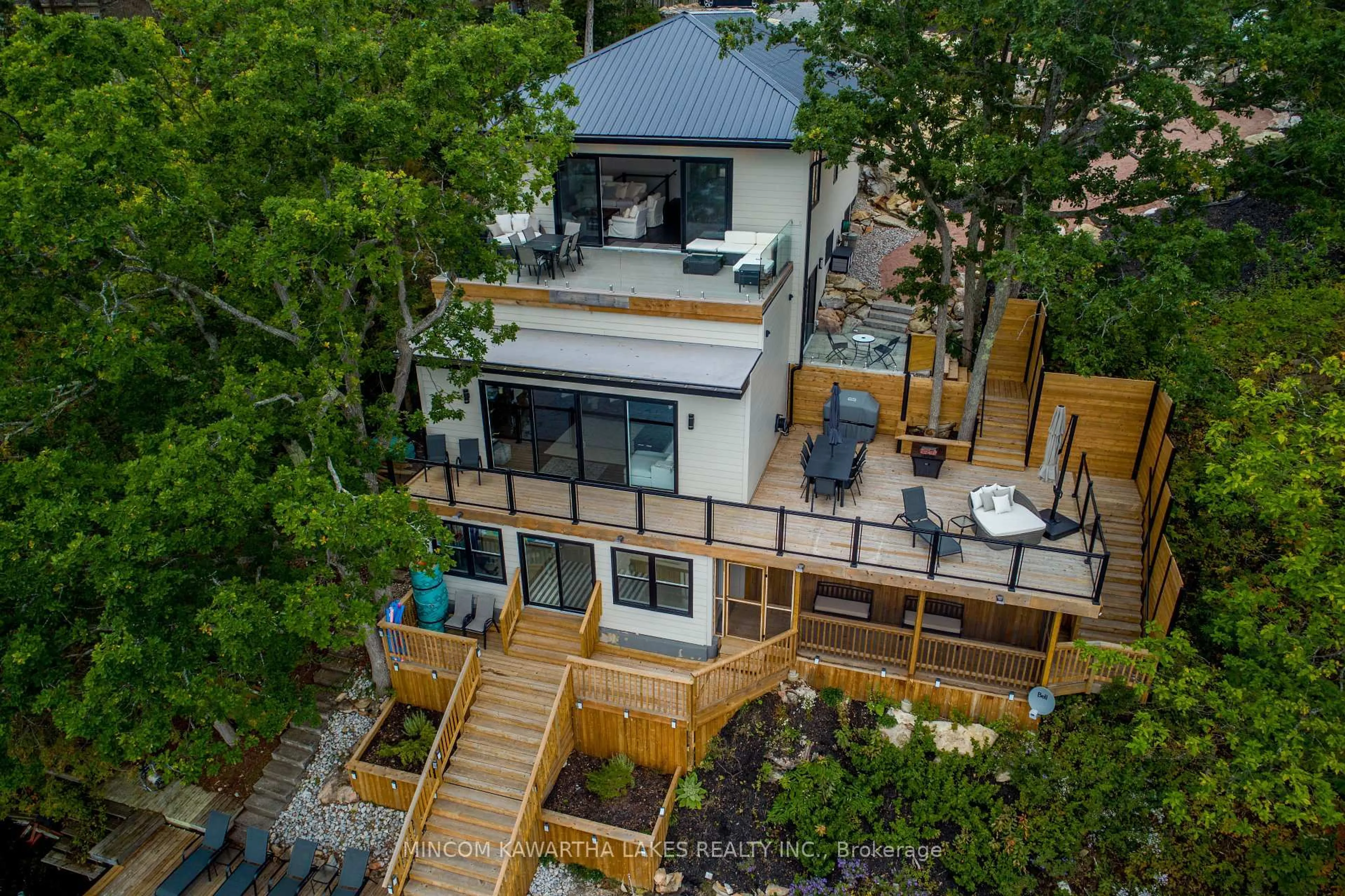 A pic from outside/outdoor area/front of a property/back of a property/a pic from drone, unknown for 1416 Northey's Bay Rd, North Kawartha Ontario K0L 3E0