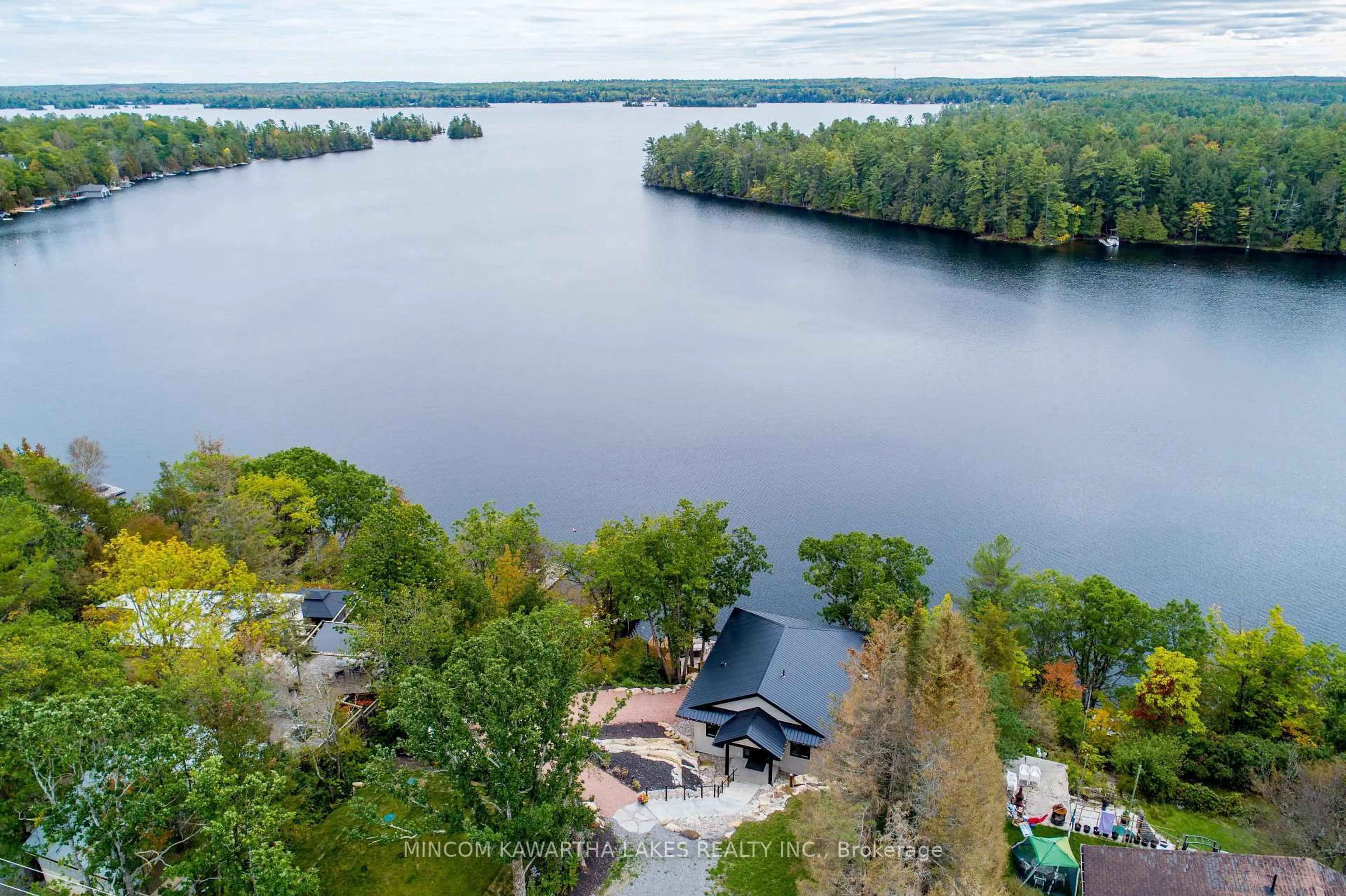 A pic from outside/outdoor area/front of a property/back of a property/a pic from drone, water/lake/river/ocean view for 1416 Northey's Bay Rd, North Kawartha Ontario K0L 3E0