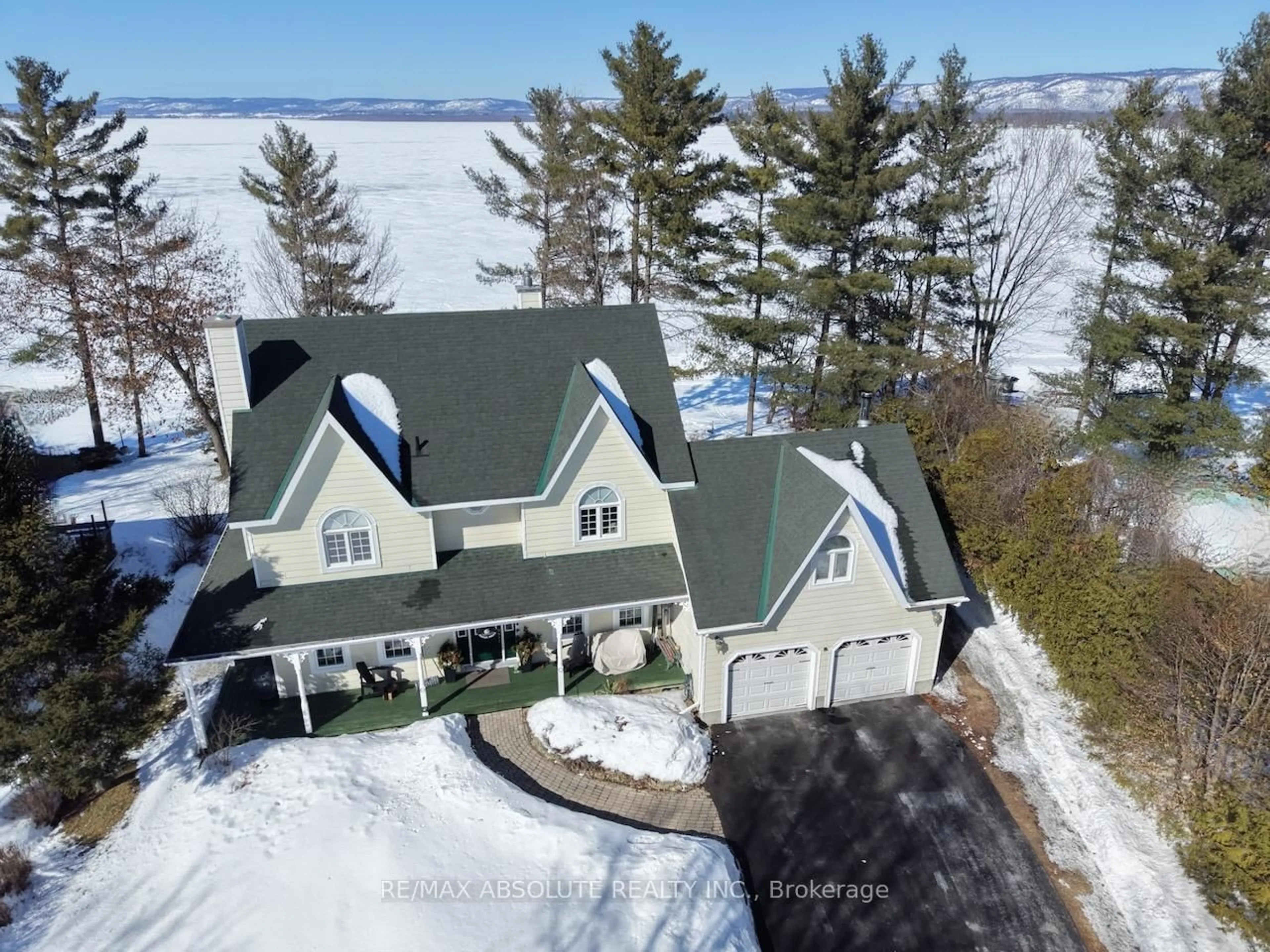 A pic from outside/outdoor area/front of a property/back of a property/a pic from drone, water/lake/river/ocean view for 4098 Armitage Ave, Ottawa Ontario K0A 1T0