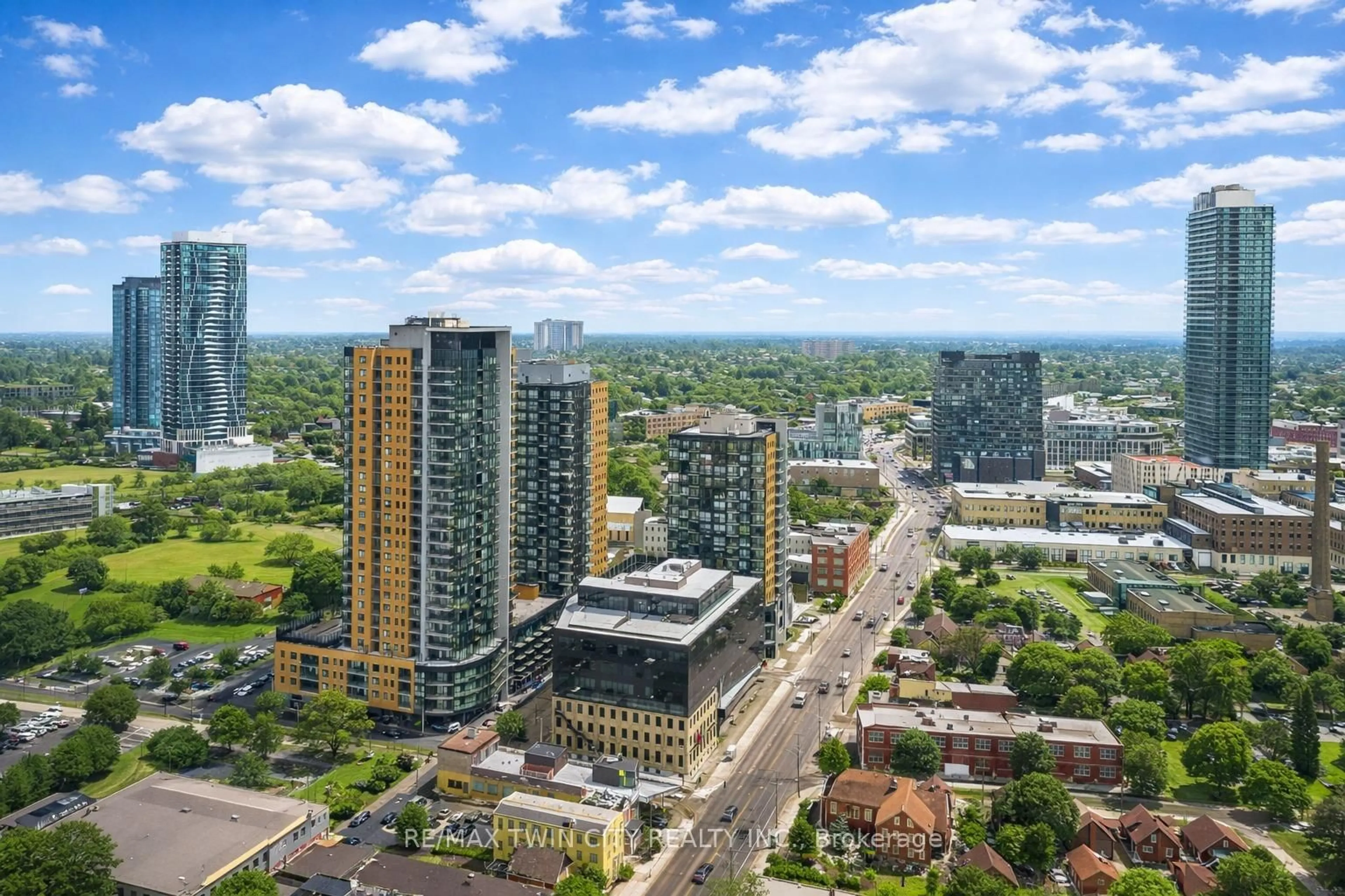 A pic from outside/outdoor area/front of a property/back of a property/a pic from drone, city buildings view from balcony for 104 Garment St #706, Kitchener Ontario N2G 0C8