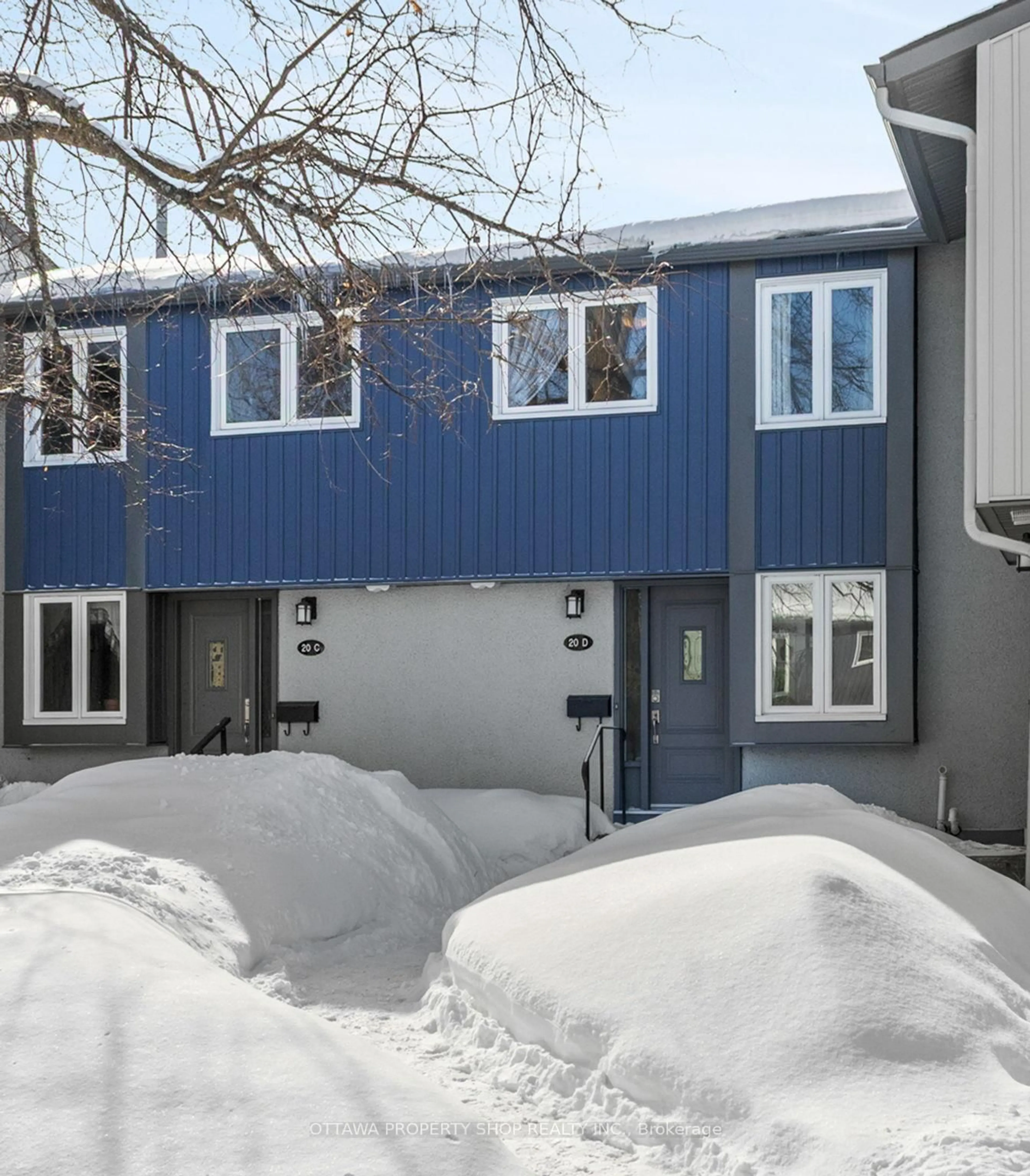 Home with vinyl exterior material, street for 20 Benlea Dr #D, Ottawa Ontario K2G 4A8