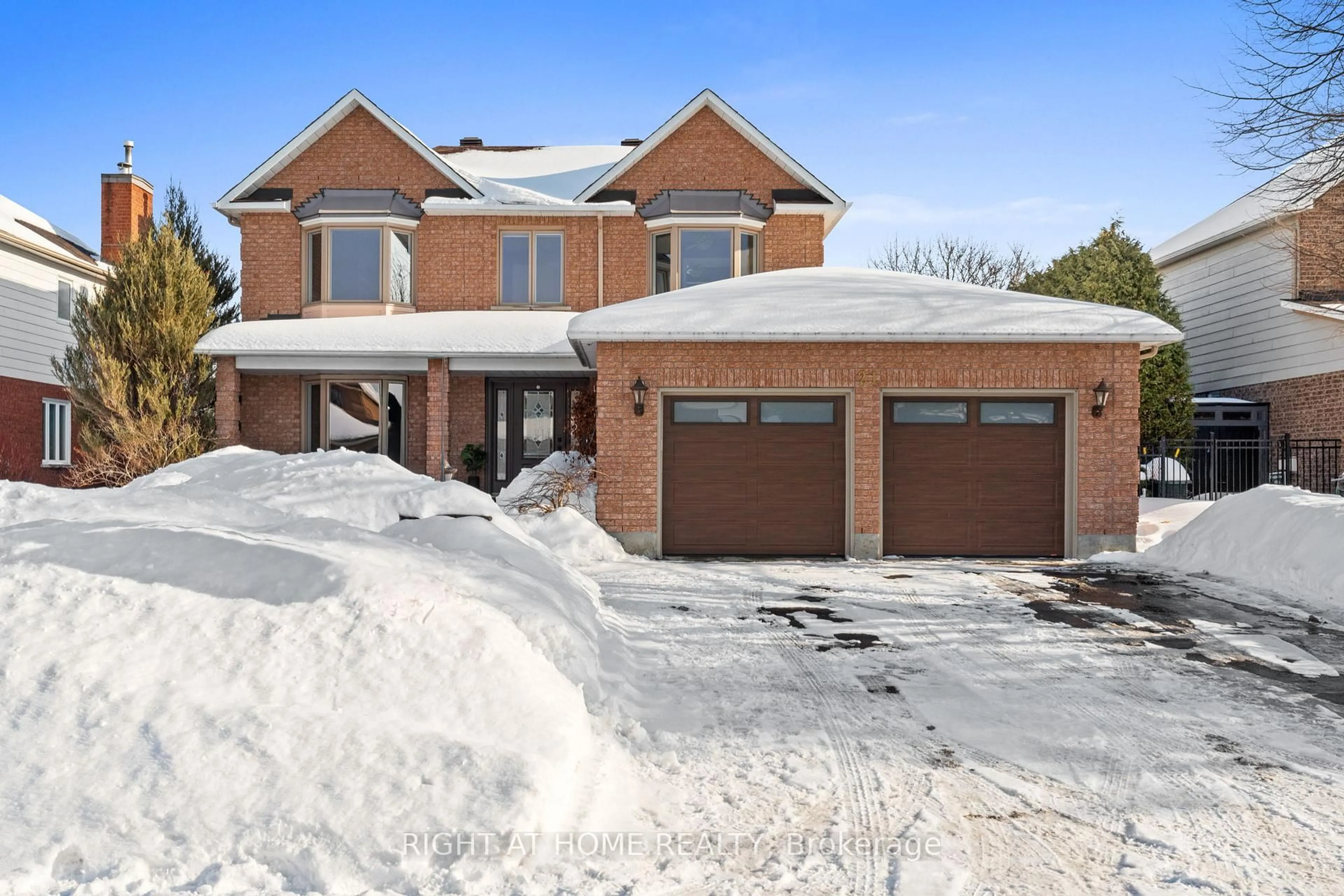 Home with brick exterior material, street for 21 SLADE Cres, Kanata Ontario K2K 2L1