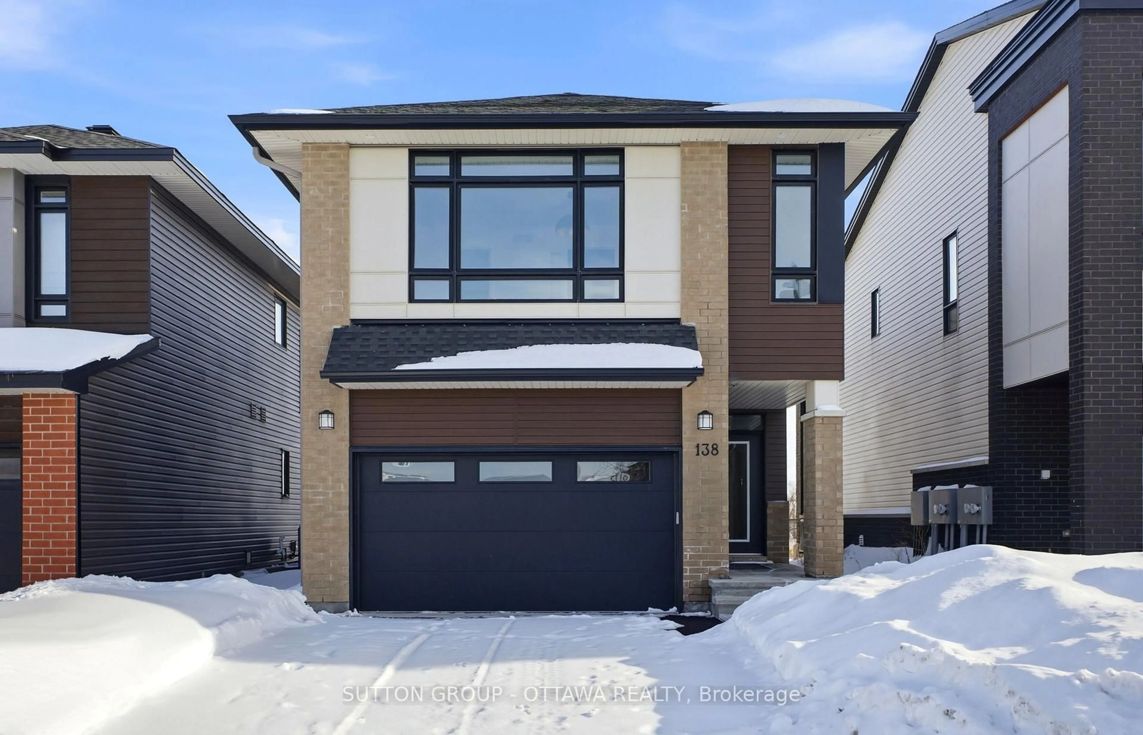 Home with brick exterior material, street for 138 Shuttleworth Dr, Ottawa Ontario K1T 0S8