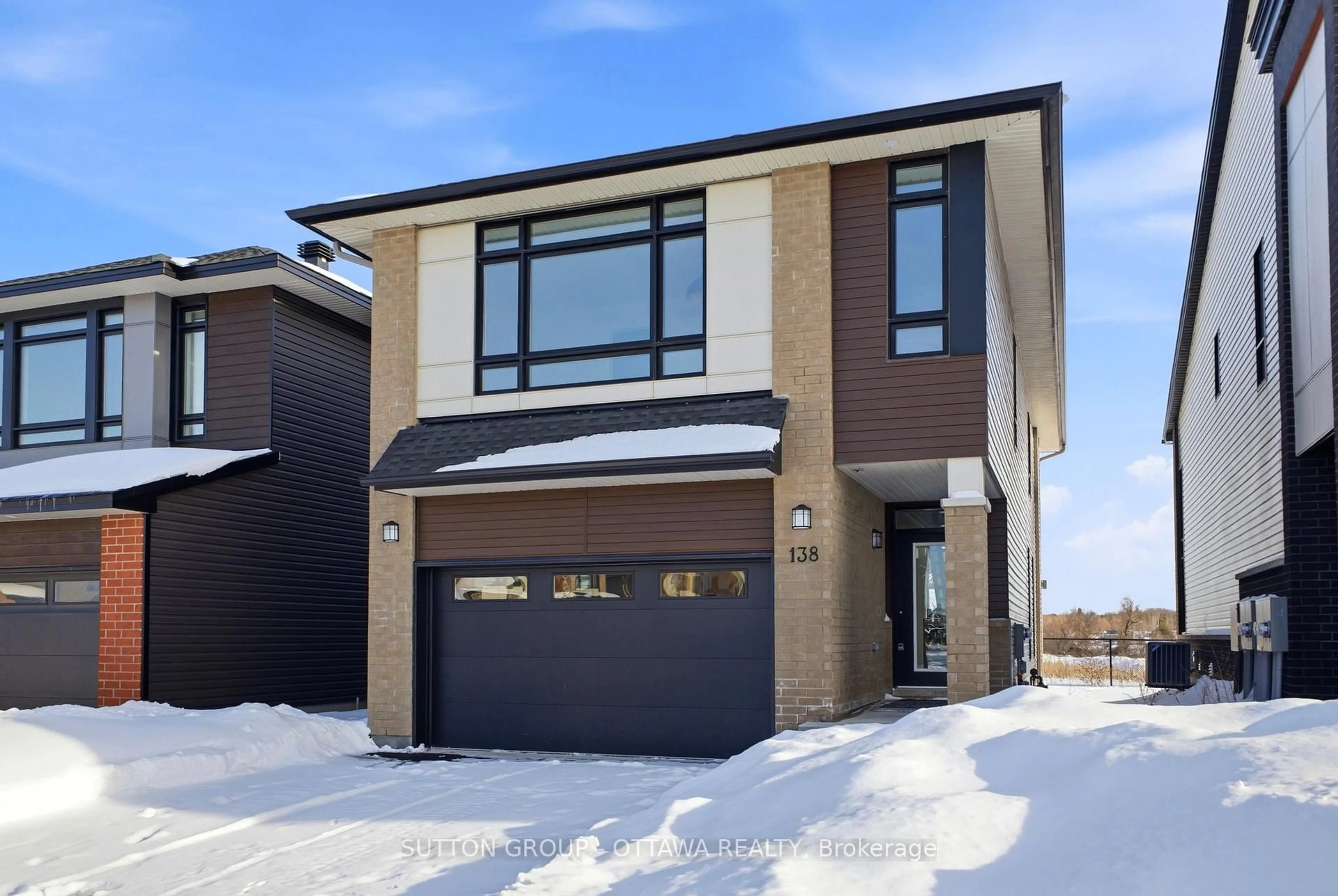 Home with brick exterior material, street for 138 Shuttleworth Dr, Ottawa Ontario K1T 0S8