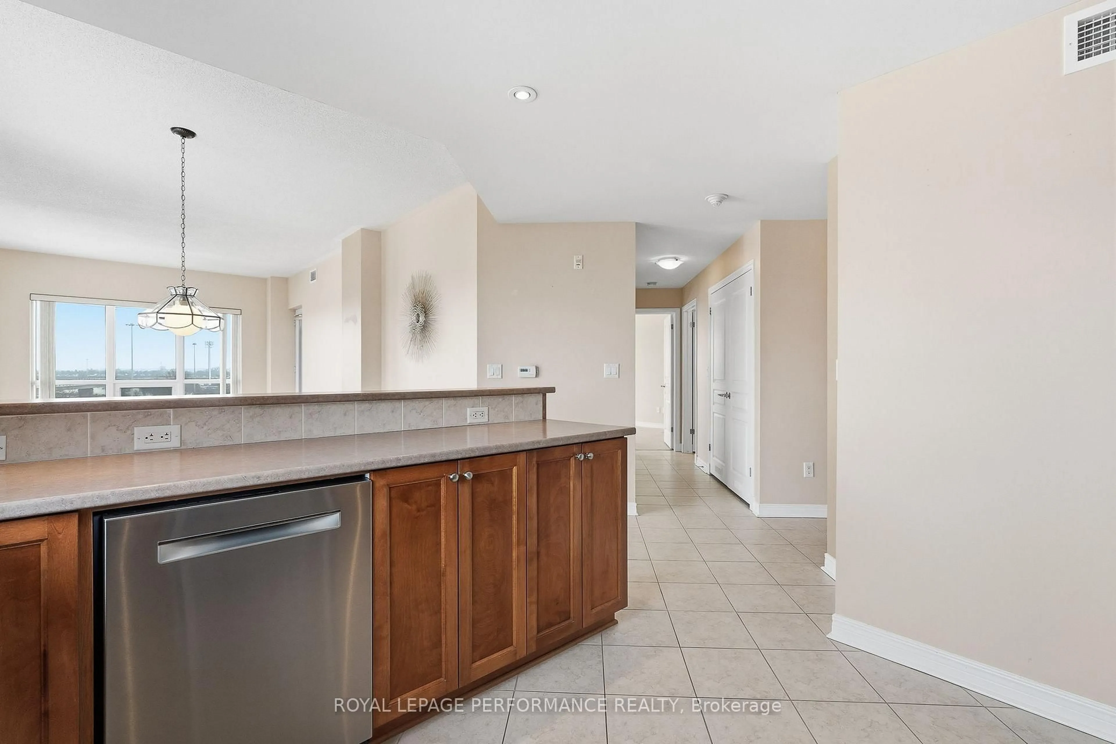 Open concept kitchen, ceramic/tile floor for 955 Beauparc Private #411, Ottawa Ontario K1J 0A2