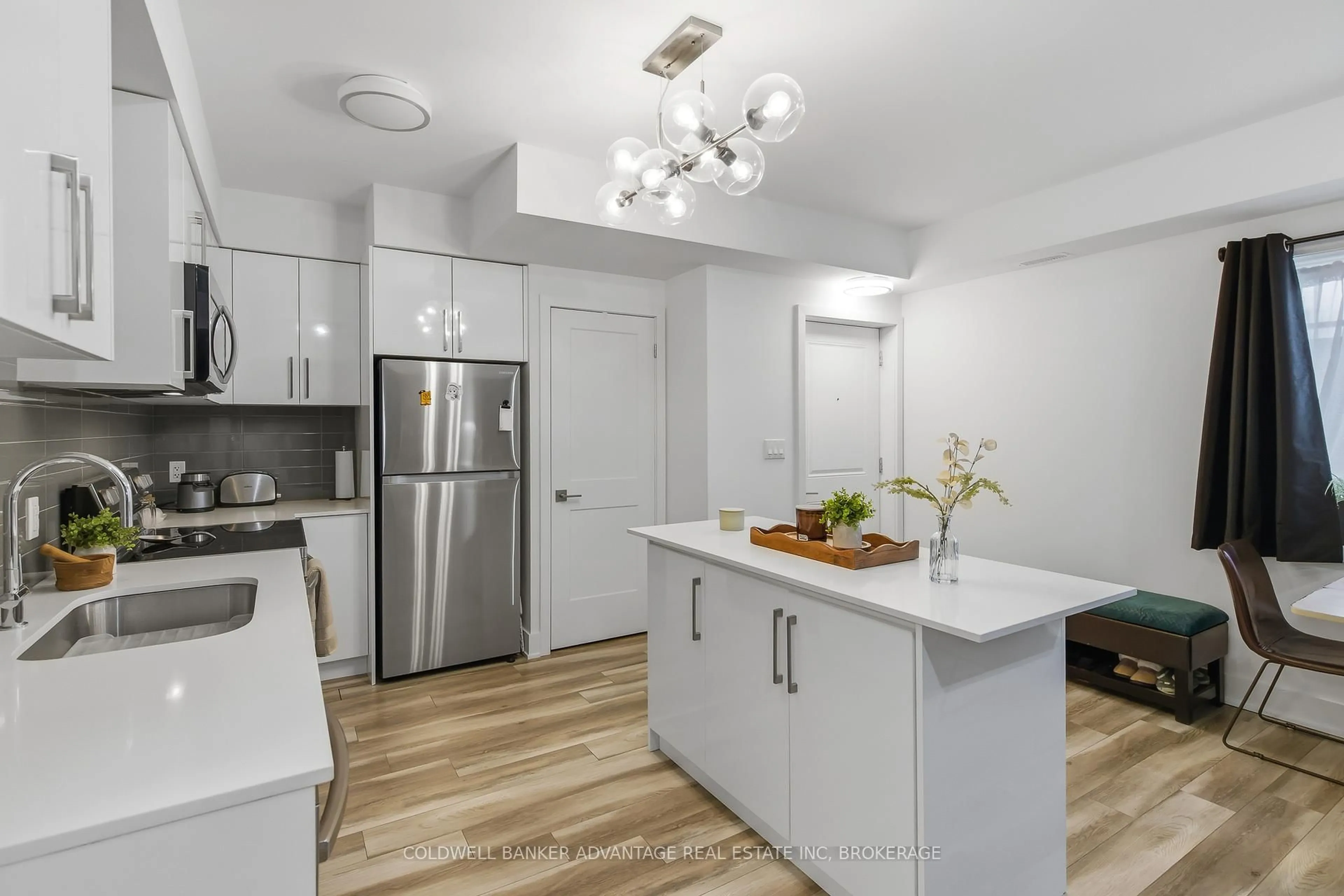 Open concept kitchen, unknown for 6065 McLeod Rd #103, Niagara Falls Ontario L2G 0Z7