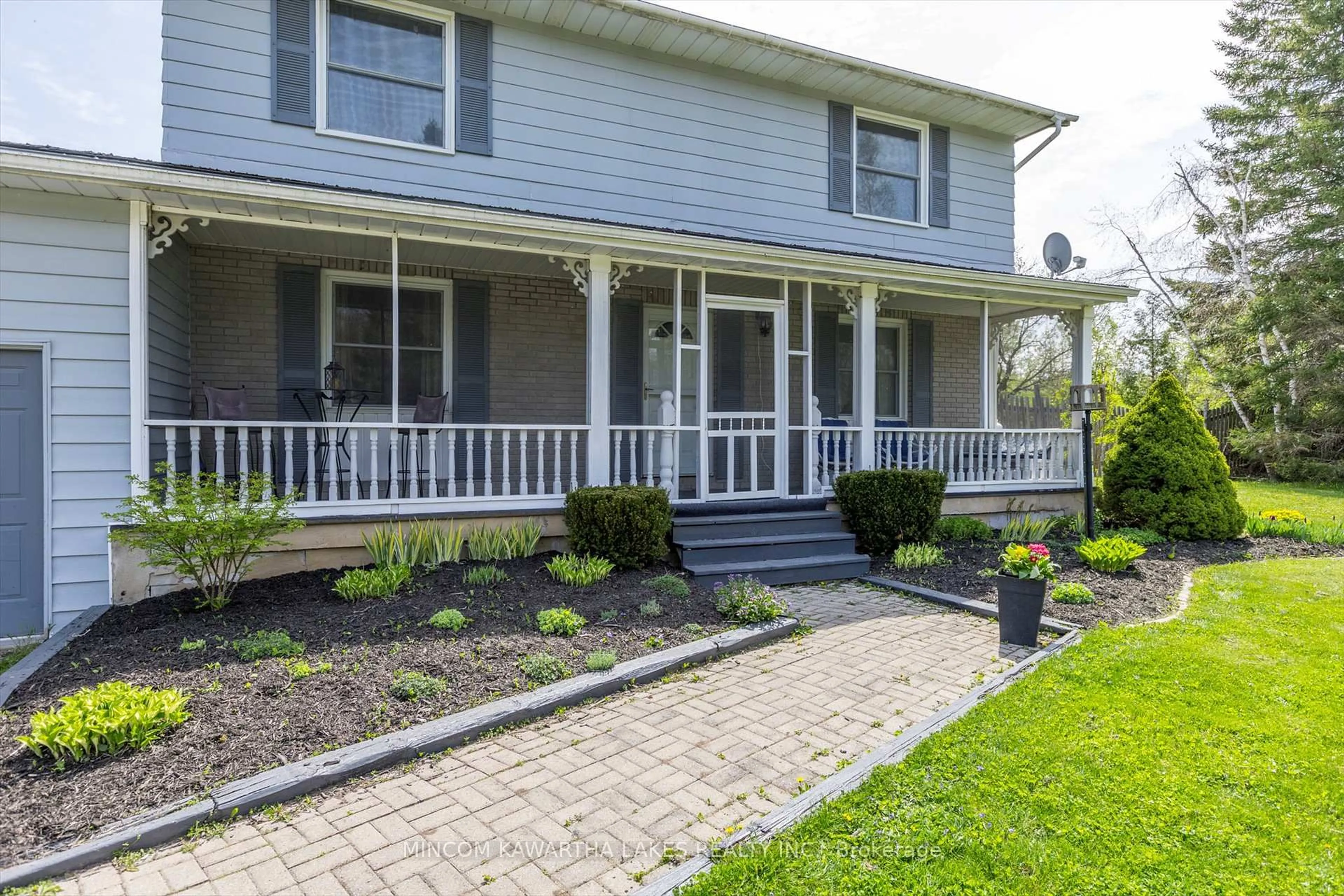 Home with vinyl exterior material, street for 1405 Hiawatha Line, Otonabee-South Monaghan Ontario K9J 6X8