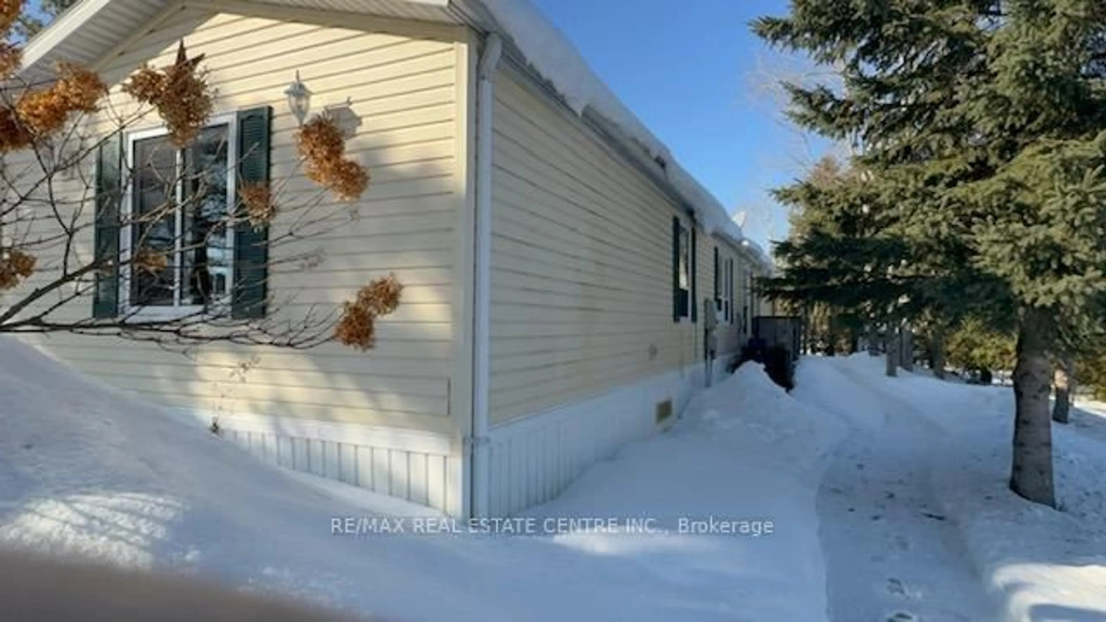 Home with vinyl exterior material, street for 40 Maple Grove Village Rd, Southgate Ontario N0C 1B0