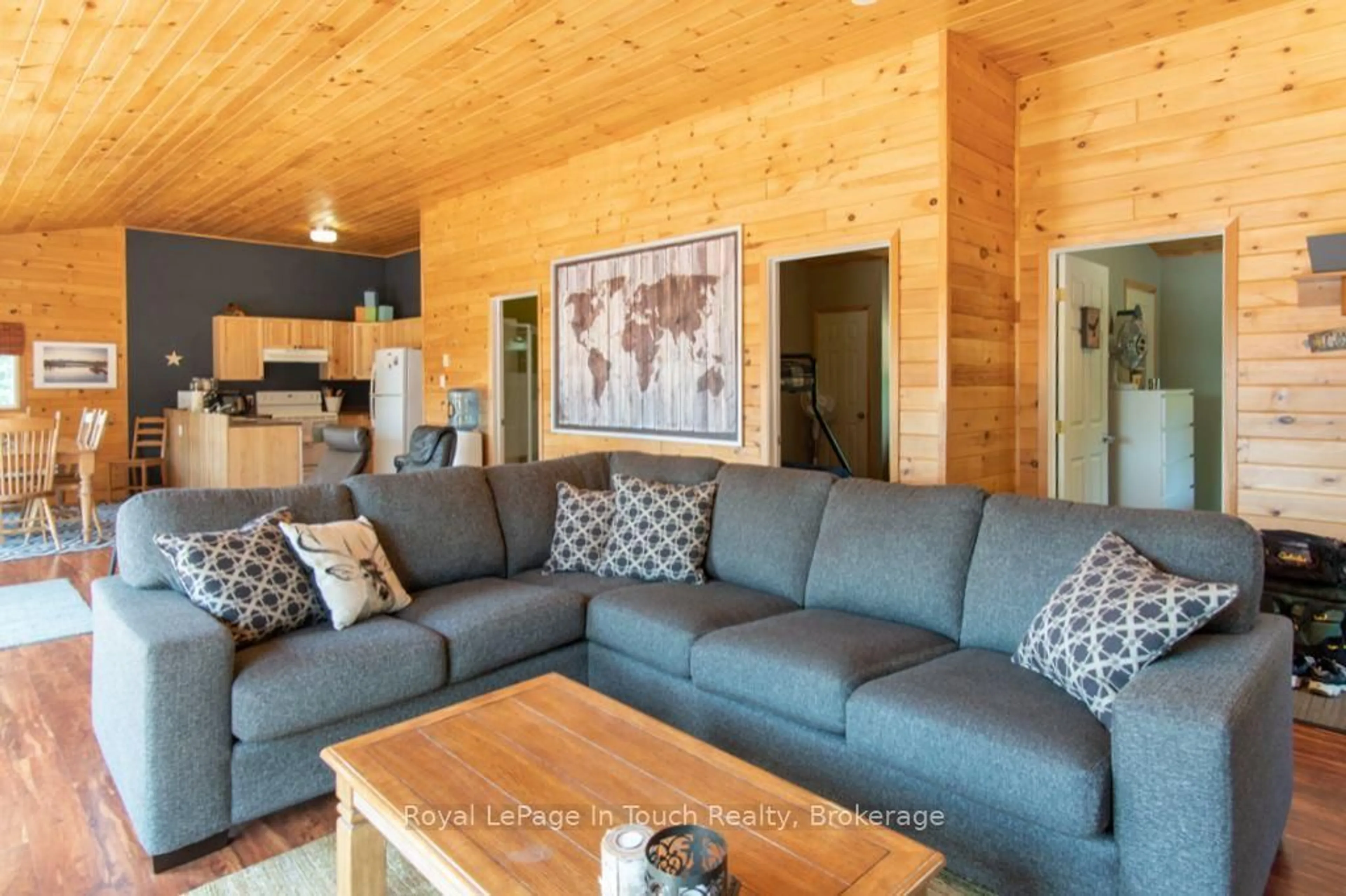 Living room with furniture, wood/laminate floor for 2974 Island 1040, Georgian Bay Ontario P0E 1E0