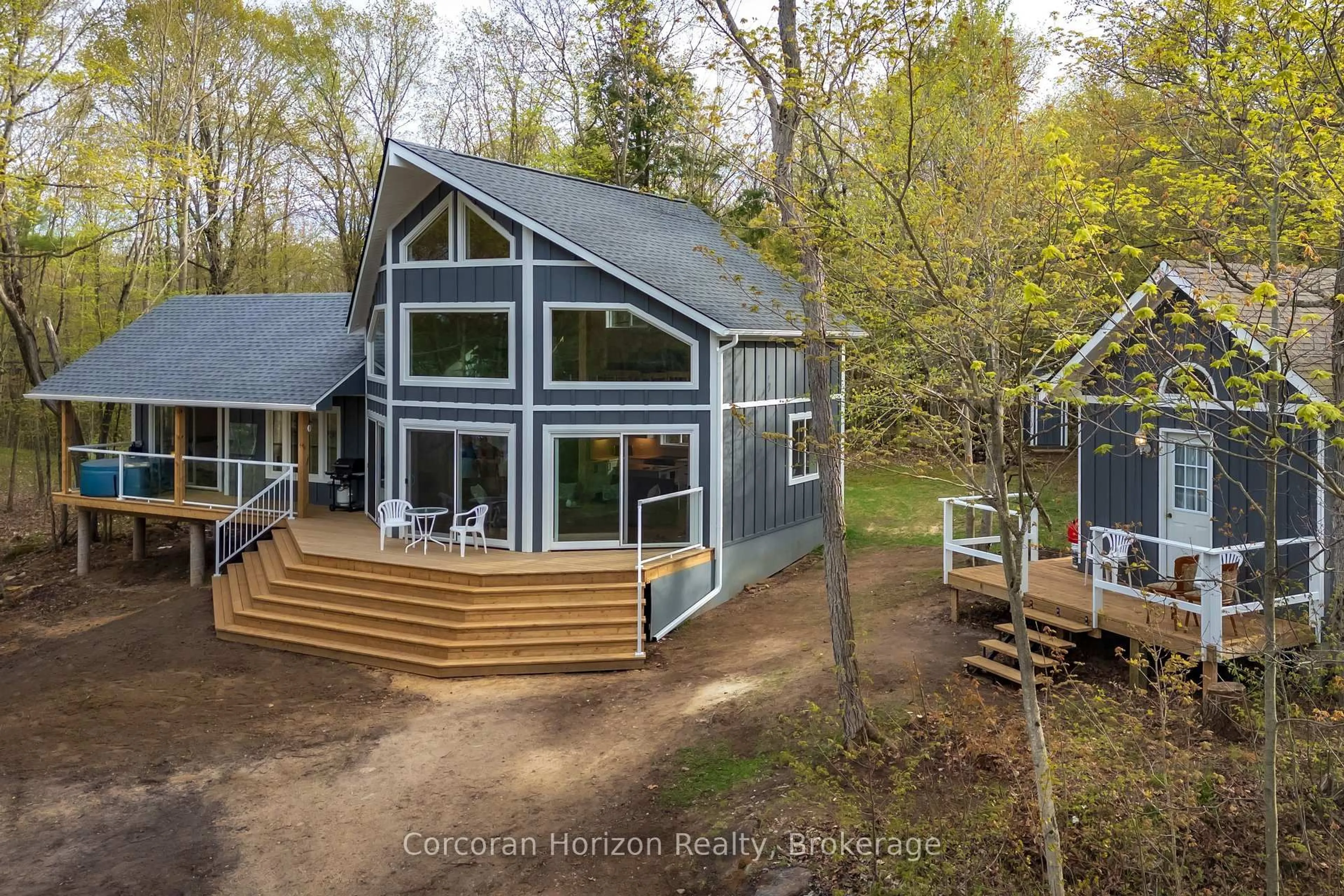 A pic from outside/outdoor area/front of a property/back of a property/a pic from drone, water/lake/river/ocean view for 9316 Georgian Bay Shore Rd, Georgian Bay Ontario P0E 1E0
