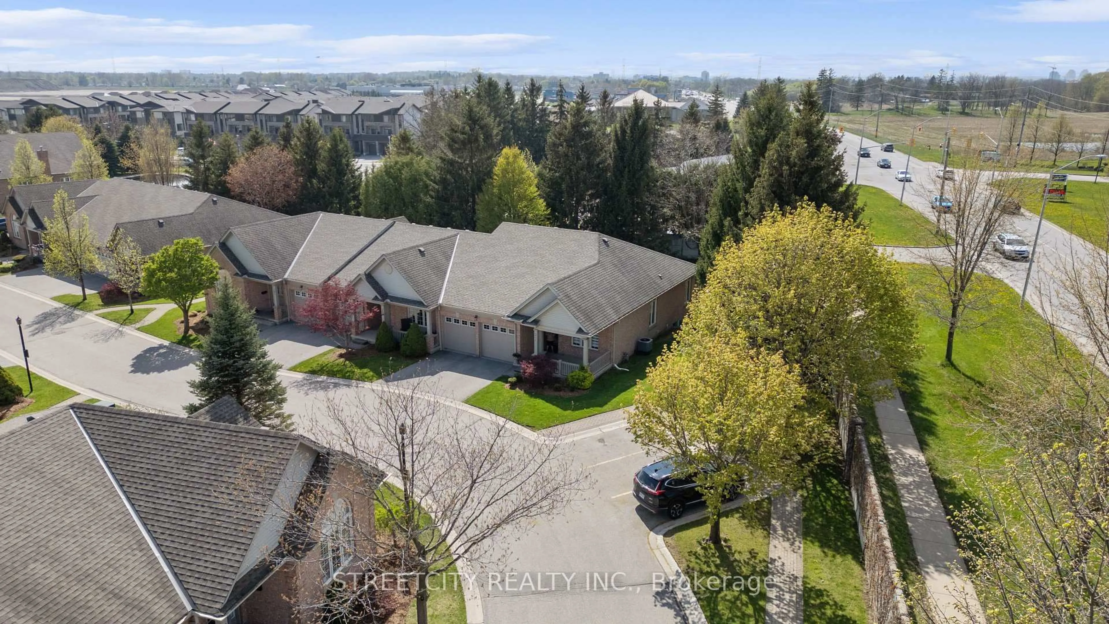 A pic from outside/outdoor area/front of a property/back of a property/a pic from drone, unknown for 2025 Meadowgate Blvd #211, London South Ontario N6M 1K9