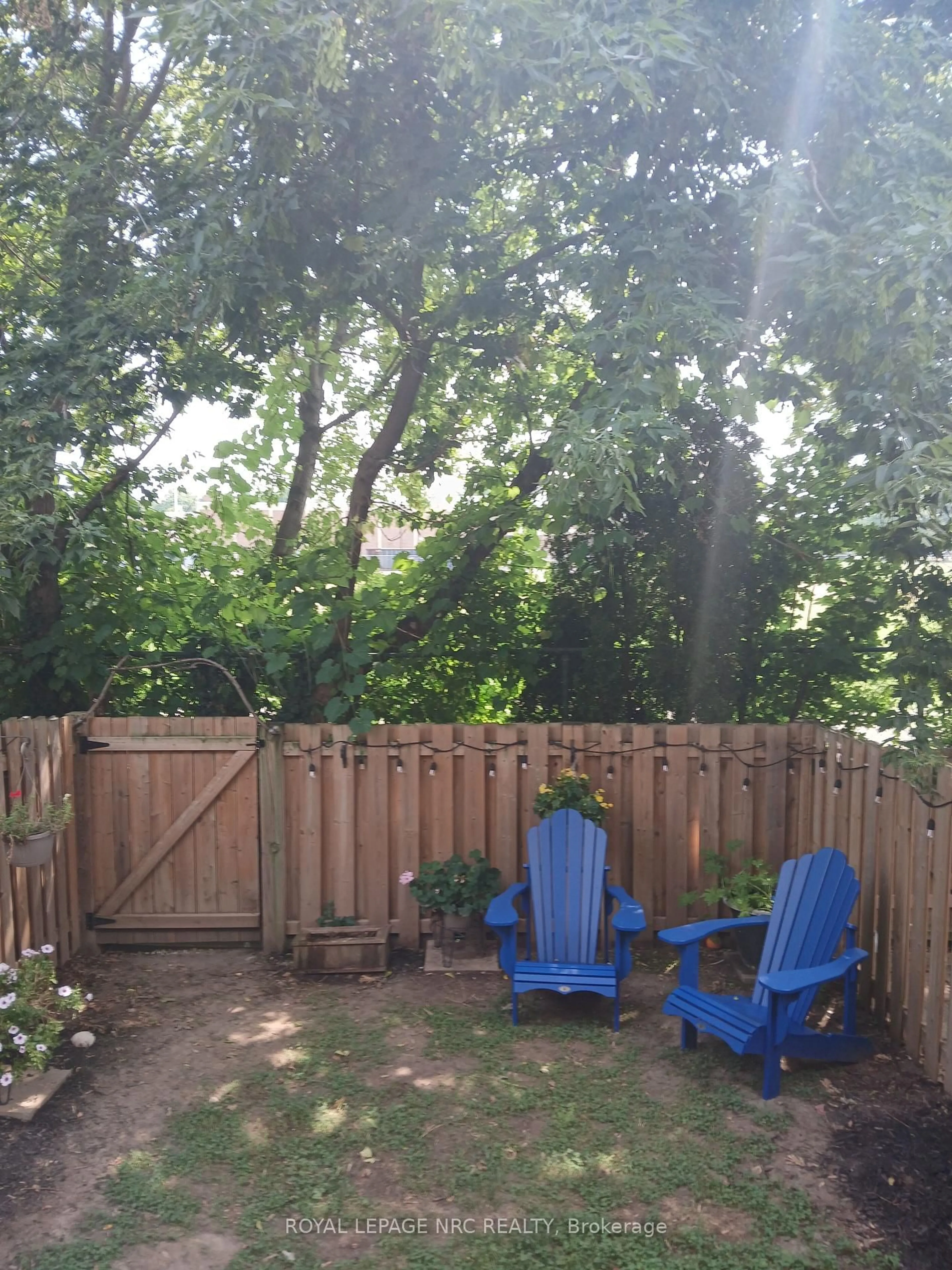 Patio, forest/trees view for 302 Vine St #31, St. Catharines Ontario L2M 7M6