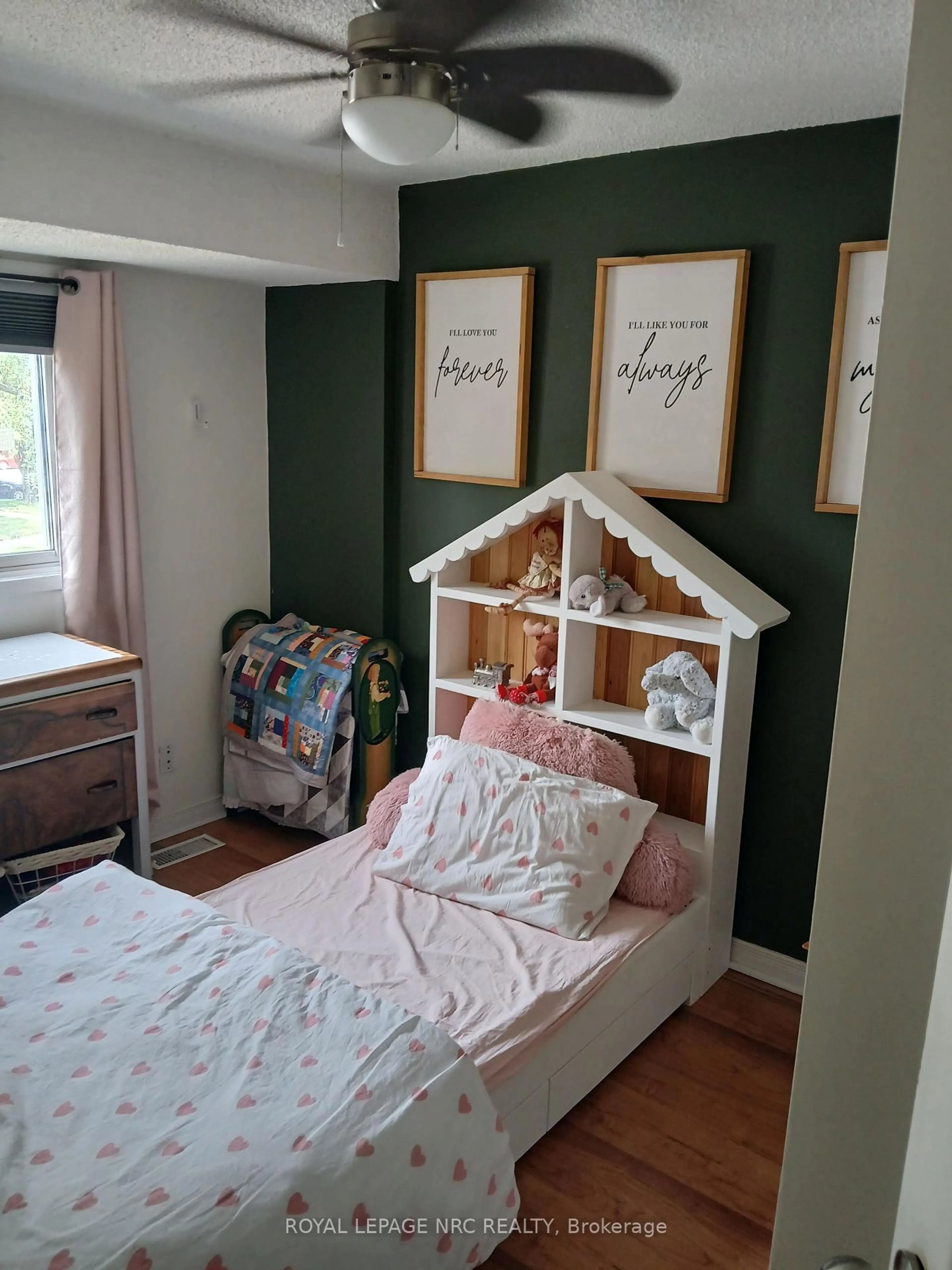 Bedroom with bed, wood/laminate floor for 302 Vine St #31, St. Catharines Ontario L2M 7M6