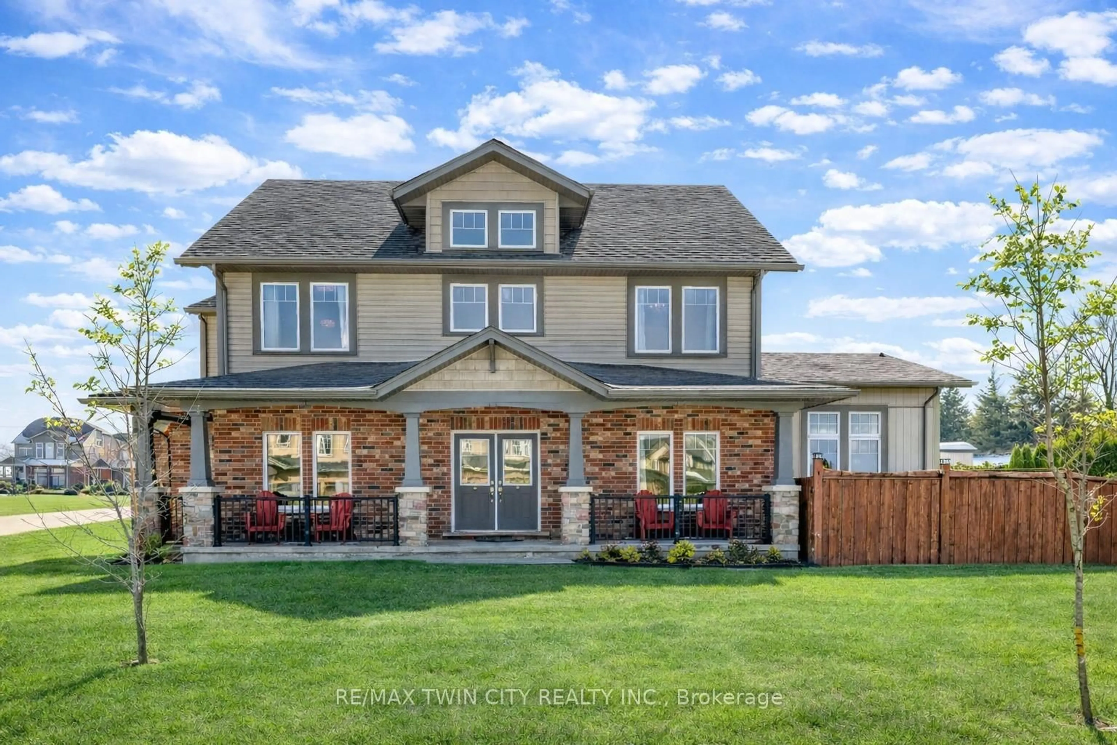 Home with brick exterior material, street for 127 Eliza Ave, Kitchener Ontario N2E 0C5