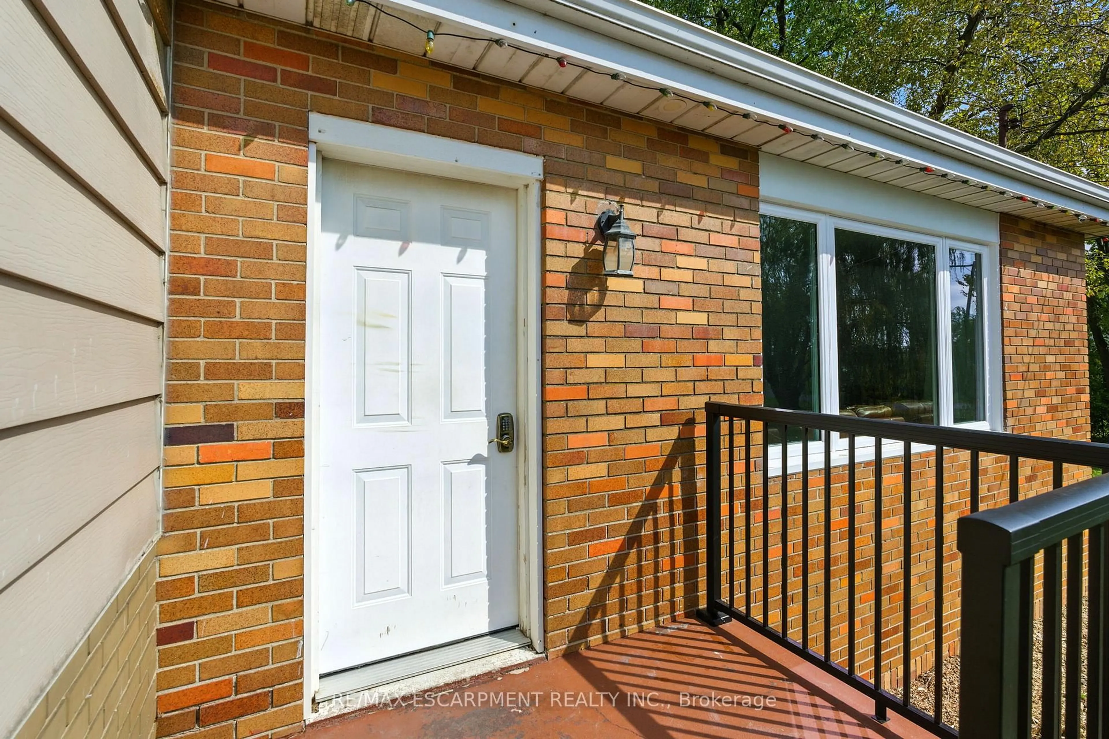 Home with brick exterior material, street for 293 #20 REGIONAL Rd, Hamilton Ontario L8J 3H4