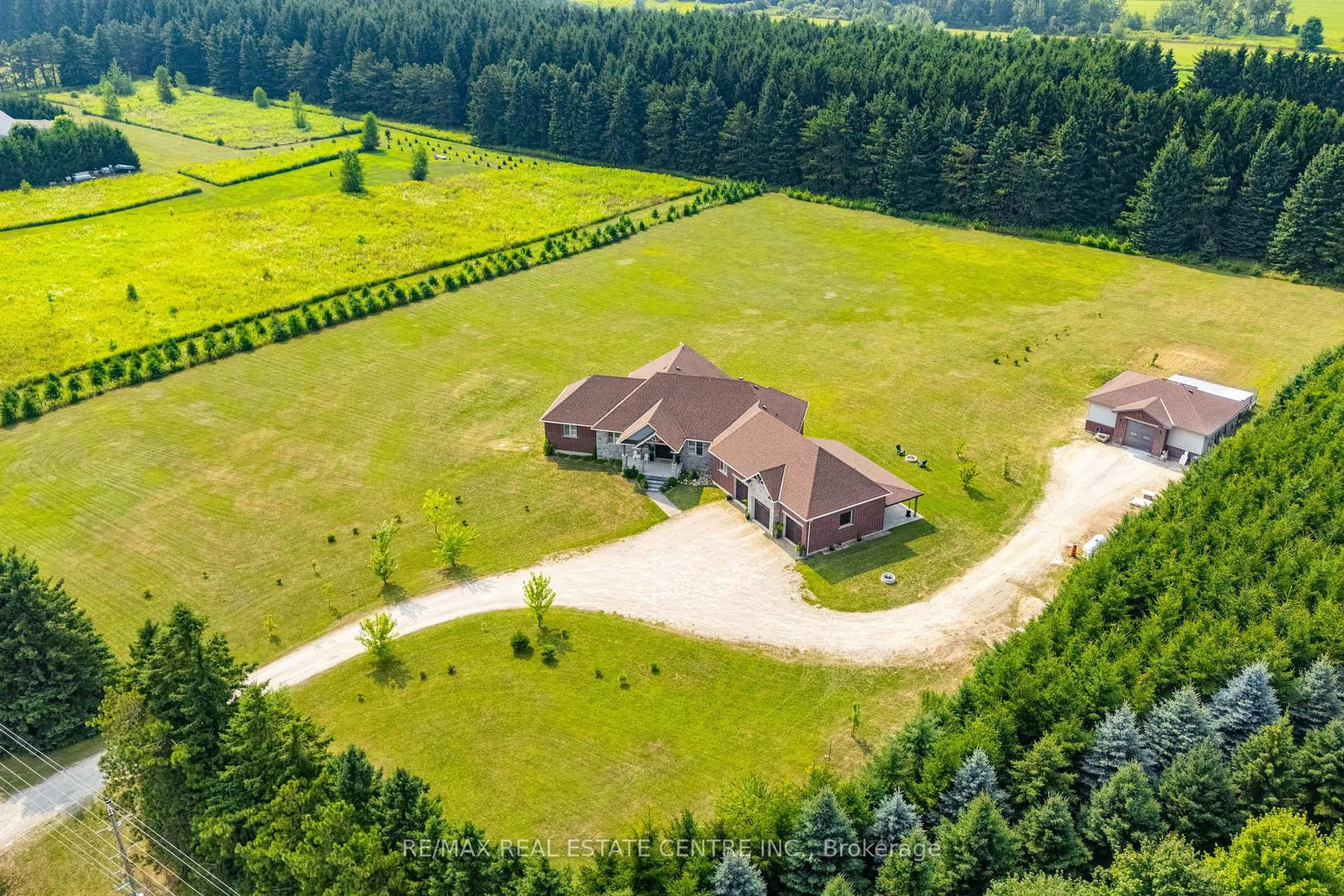 A pic from outside/outdoor area/front of a property/back of a property/a pic from drone, forest/trees view for 023181 Erin East Garafraxa Townline, East Garafraxa Ontario L9W 7G8