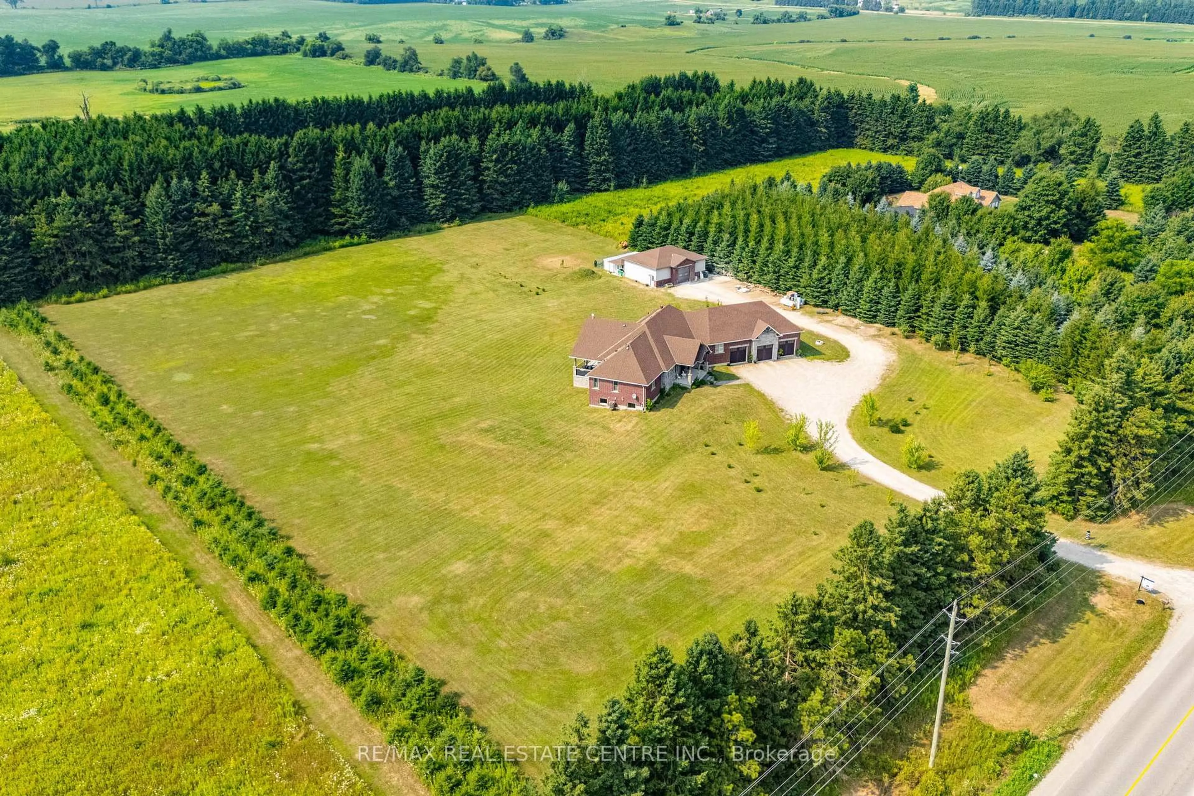 A pic from outside/outdoor area/front of a property/back of a property/a pic from drone, forest/trees view for 023181 Erin East Garafraxa Townline, East Garafraxa Ontario L9W 7G8
