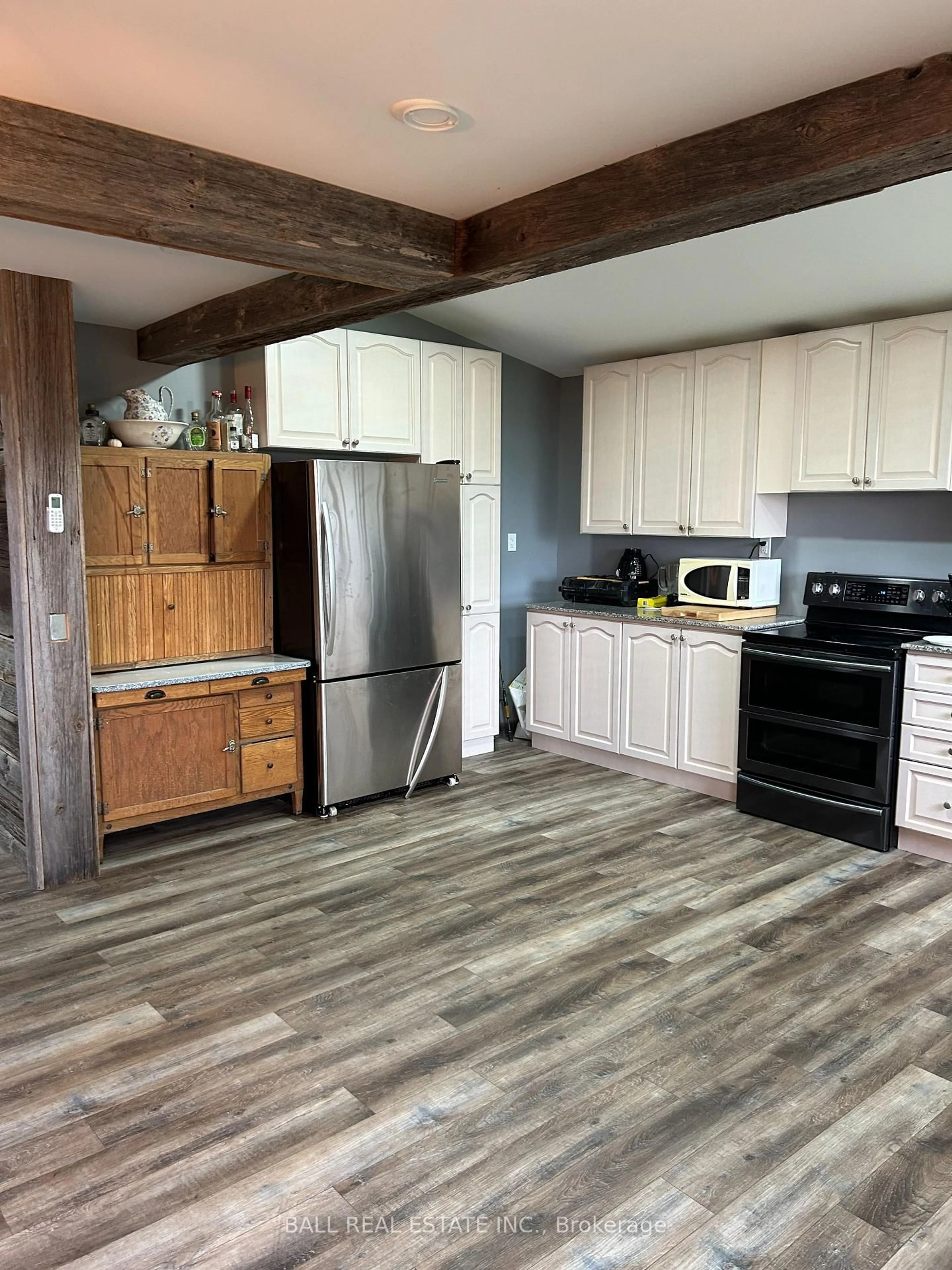 Open concept kitchen, wood/laminate floor for 732 13th Line, Trent Hills Ontario K0L 1L0