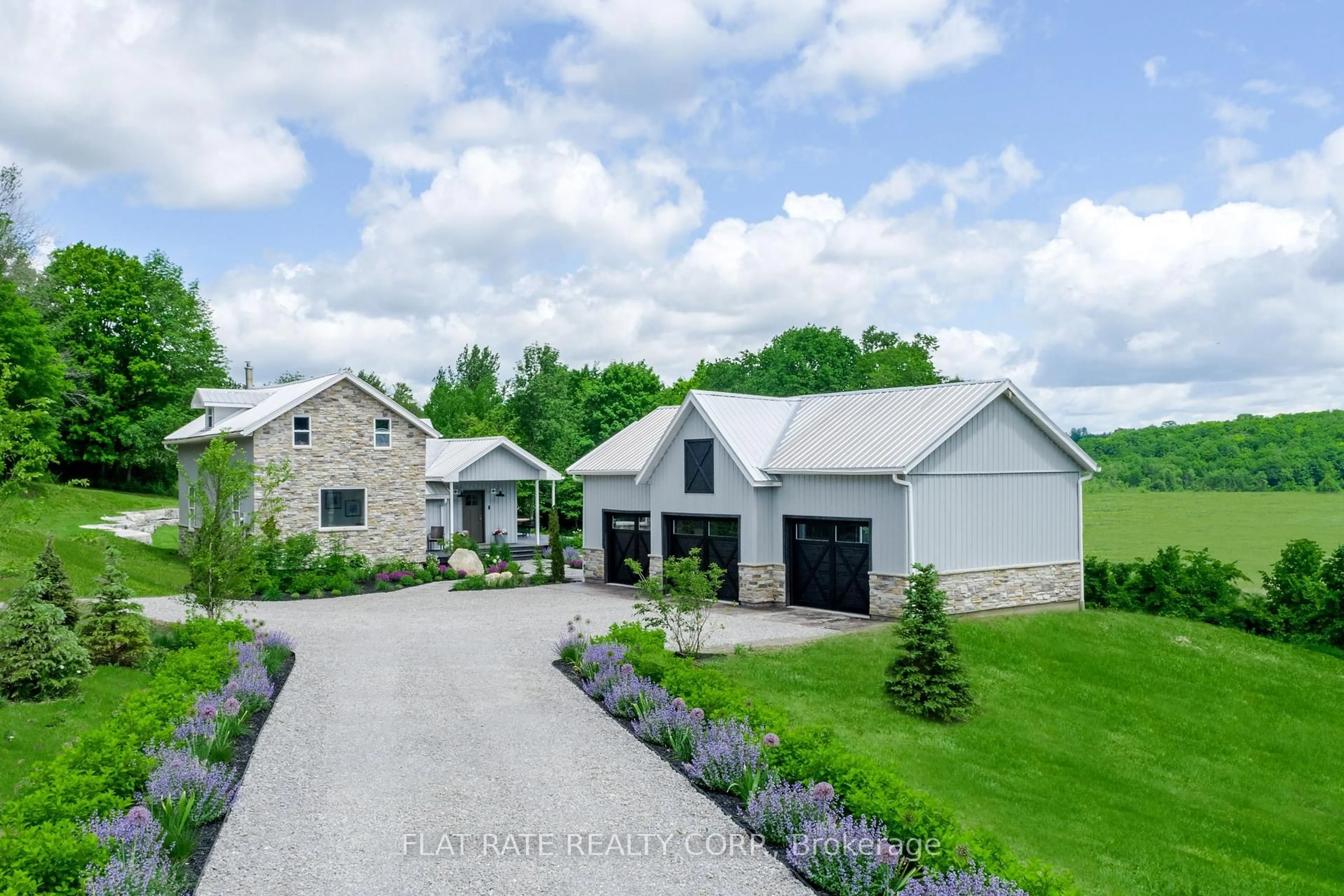 A pic from outside/outdoor area/front of a property/back of a property/a pic from drone, street for 1009 Serpent Mounds Rd, Otonabee-South Monaghan Ontario K0L 2G0