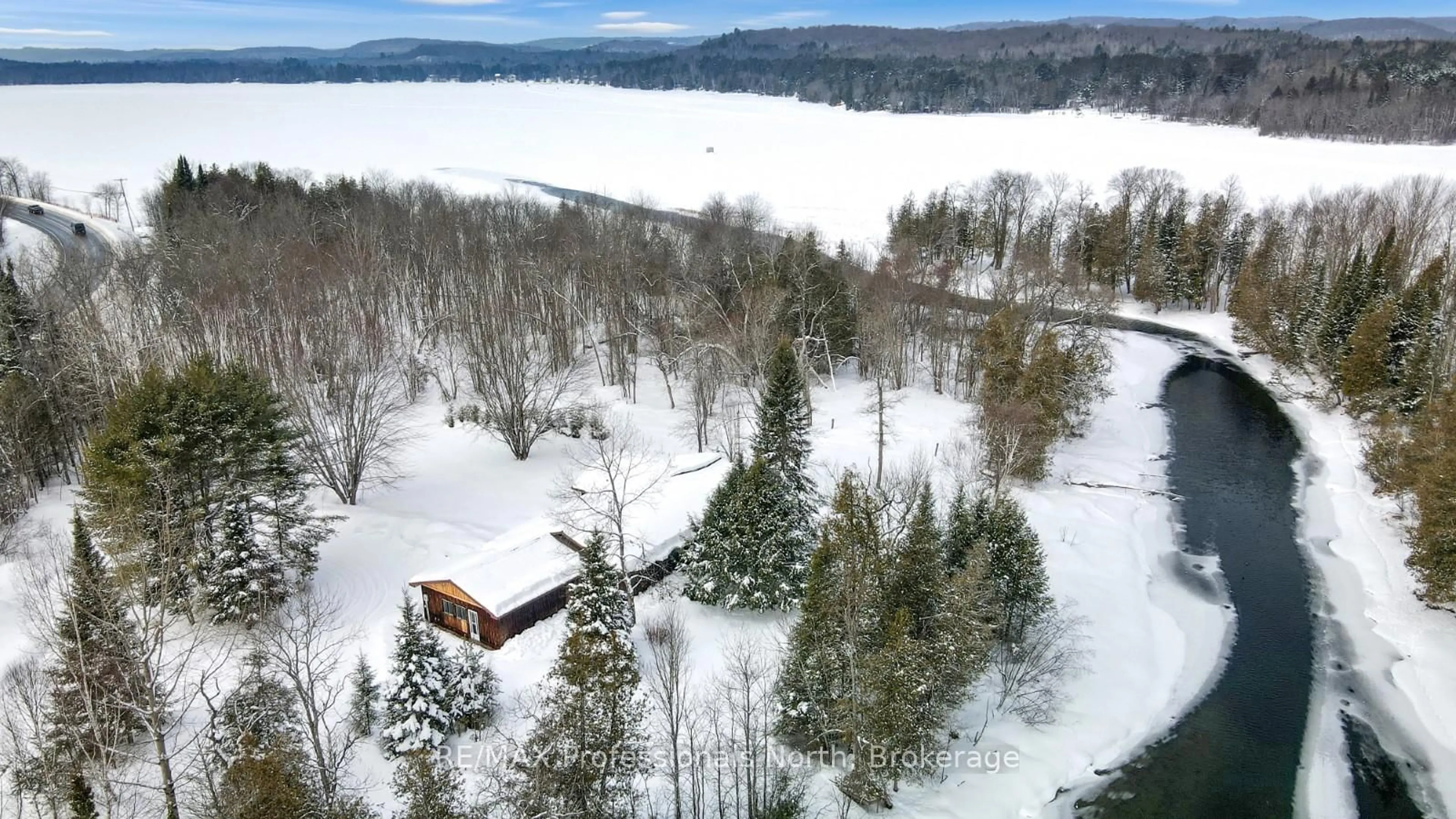 A pic from outside/outdoor area/front of a property/back of a property/a pic from drone, unknown for 11601 Highway 118 Highway, Dysart et al Ontario K0M 1S0