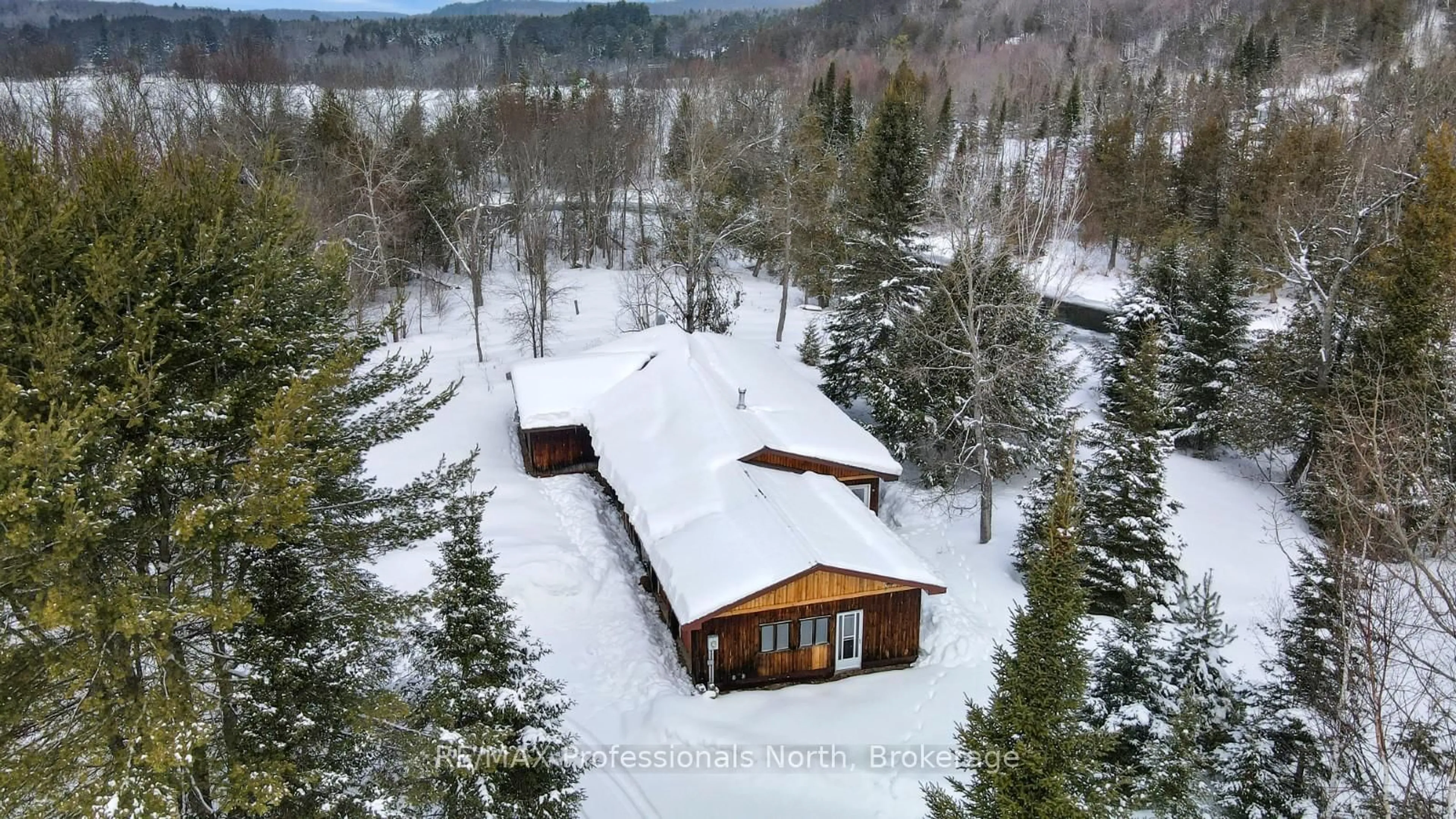 A pic from outside/outdoor area/front of a property/back of a property/a pic from drone, unknown for 11601 Highway 118 Highway, Dysart et al Ontario K0M 1S0