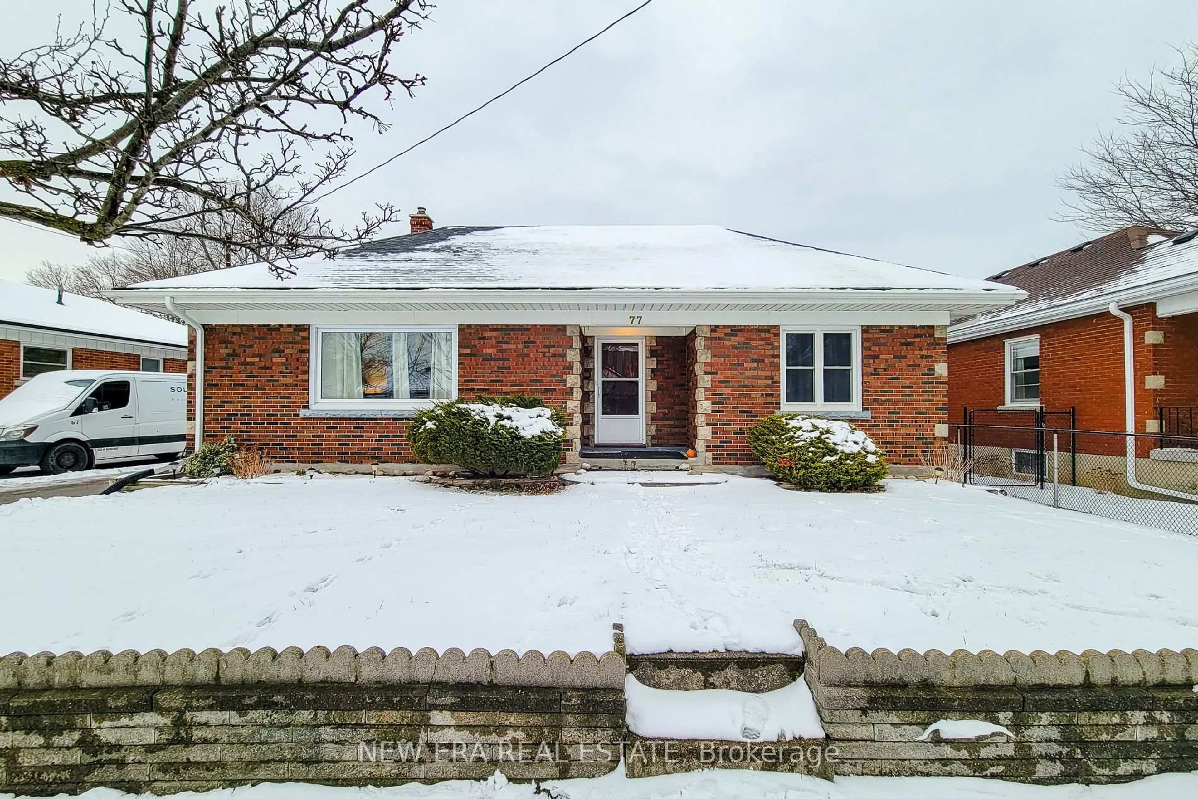 Home with brick exterior material, street for 77 Tenth Ave, Brantford Ontario N3S 1G5