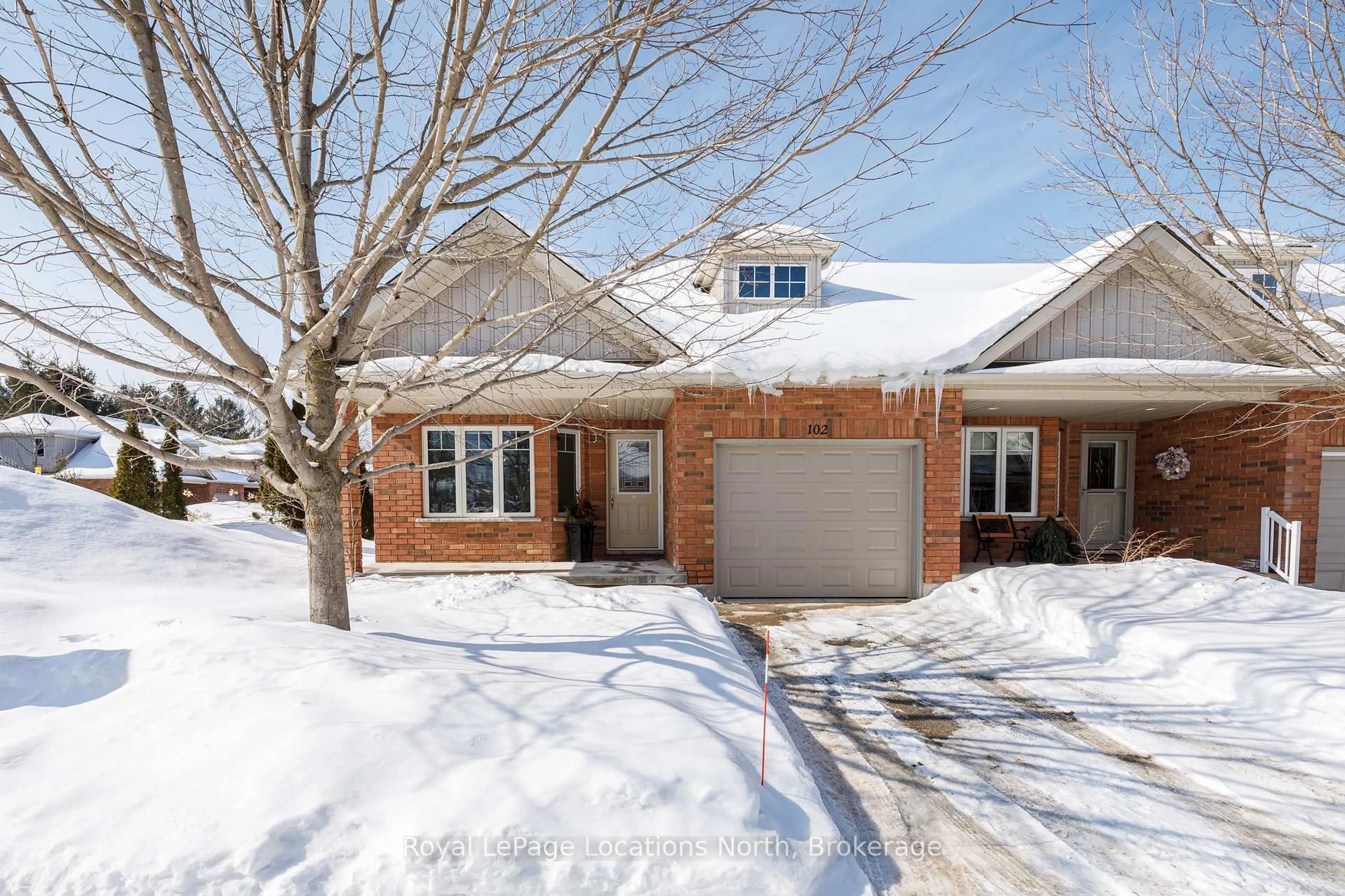 Home with brick exterior material, street for 102 Empire Lane, Meaford Ontario N4L 0A5