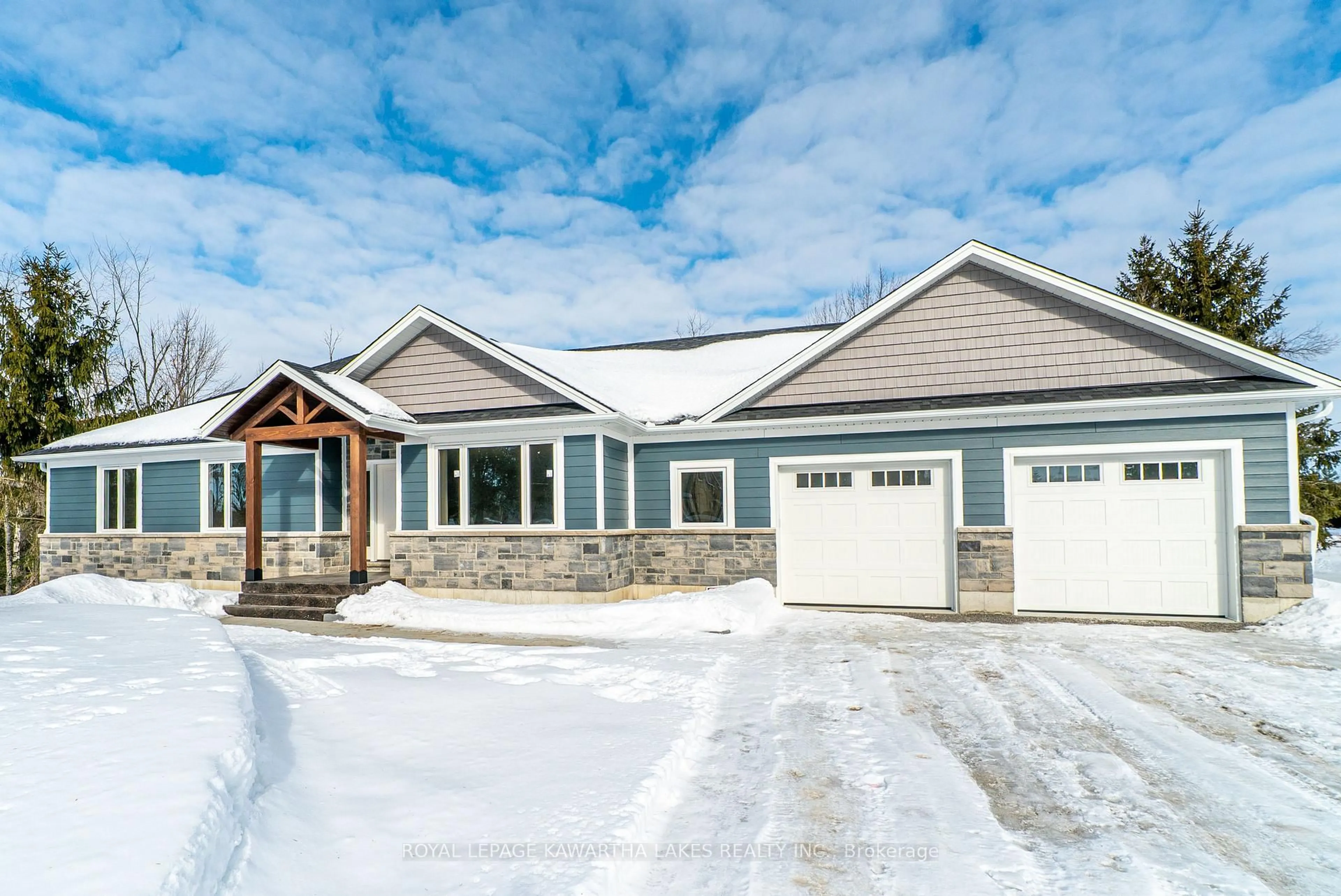 Home with vinyl exterior material, street for 10 Patrick St, Kawartha Lakes Ontario K0M 2B0