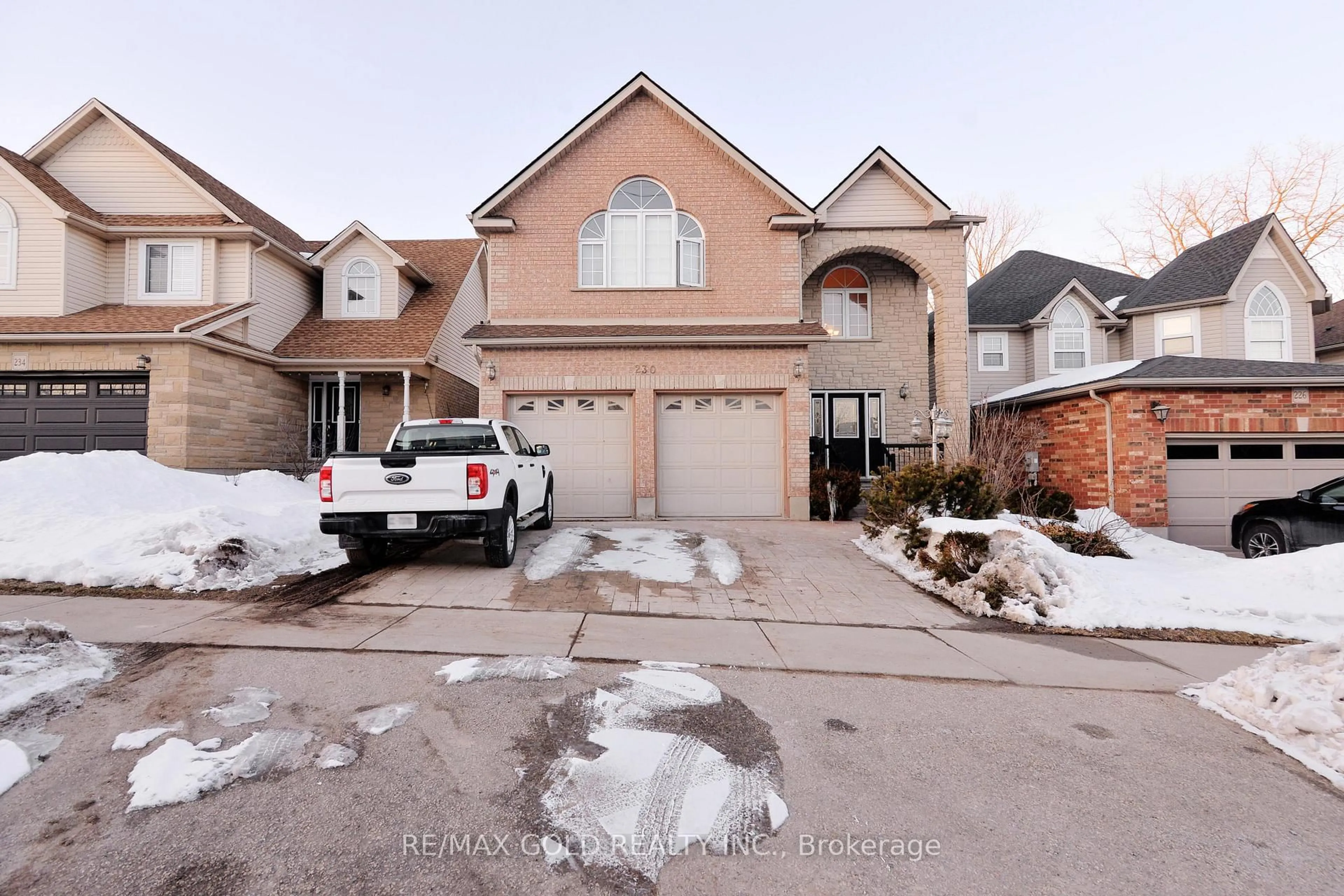 Home with brick exterior material, street for 230 Doon Mills Dr, Kitchener Ontario N2P 2R8
