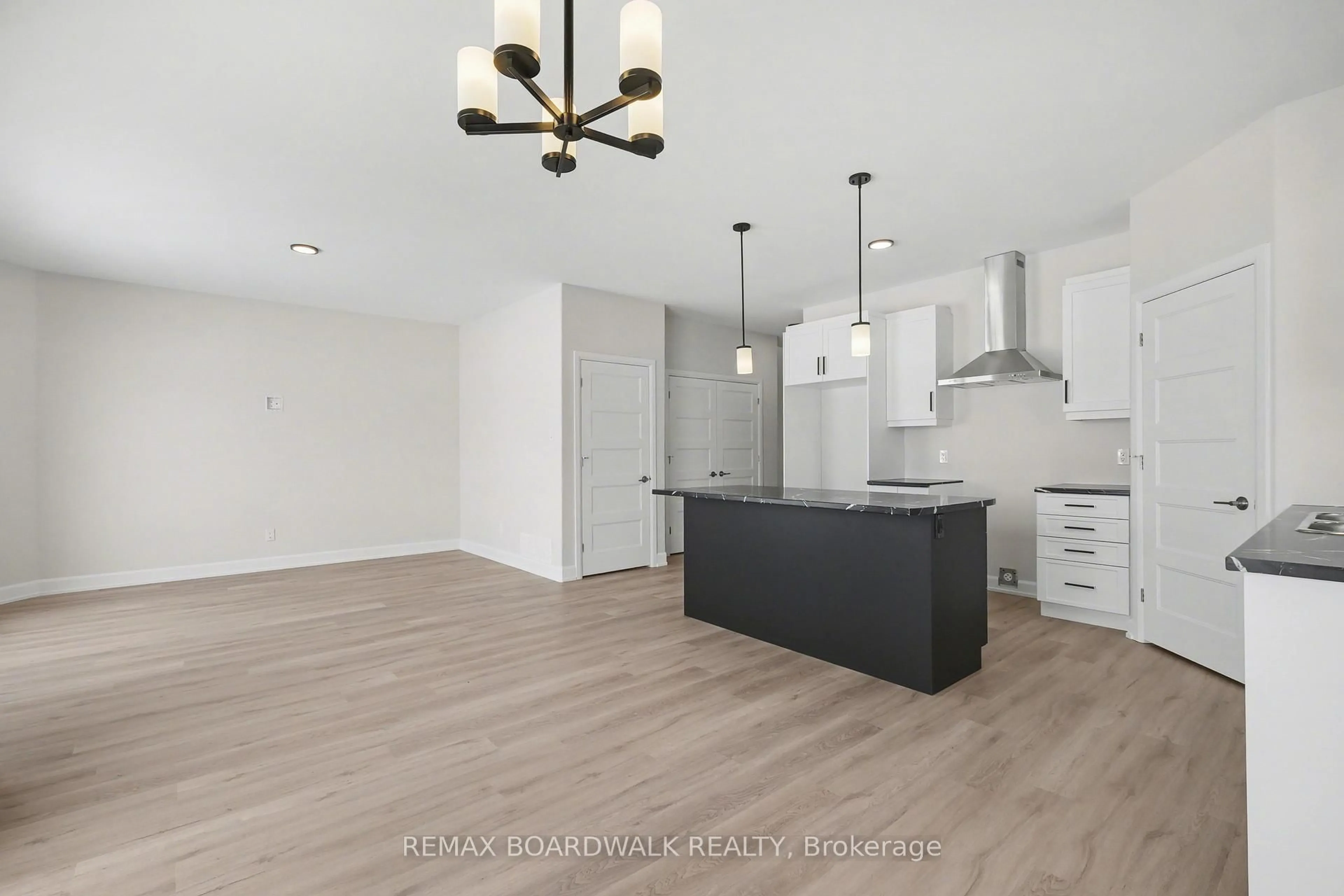 Open concept kitchen, wood/laminate floor for 967 Chablis Cres, Russell Ontario K0A 1W0