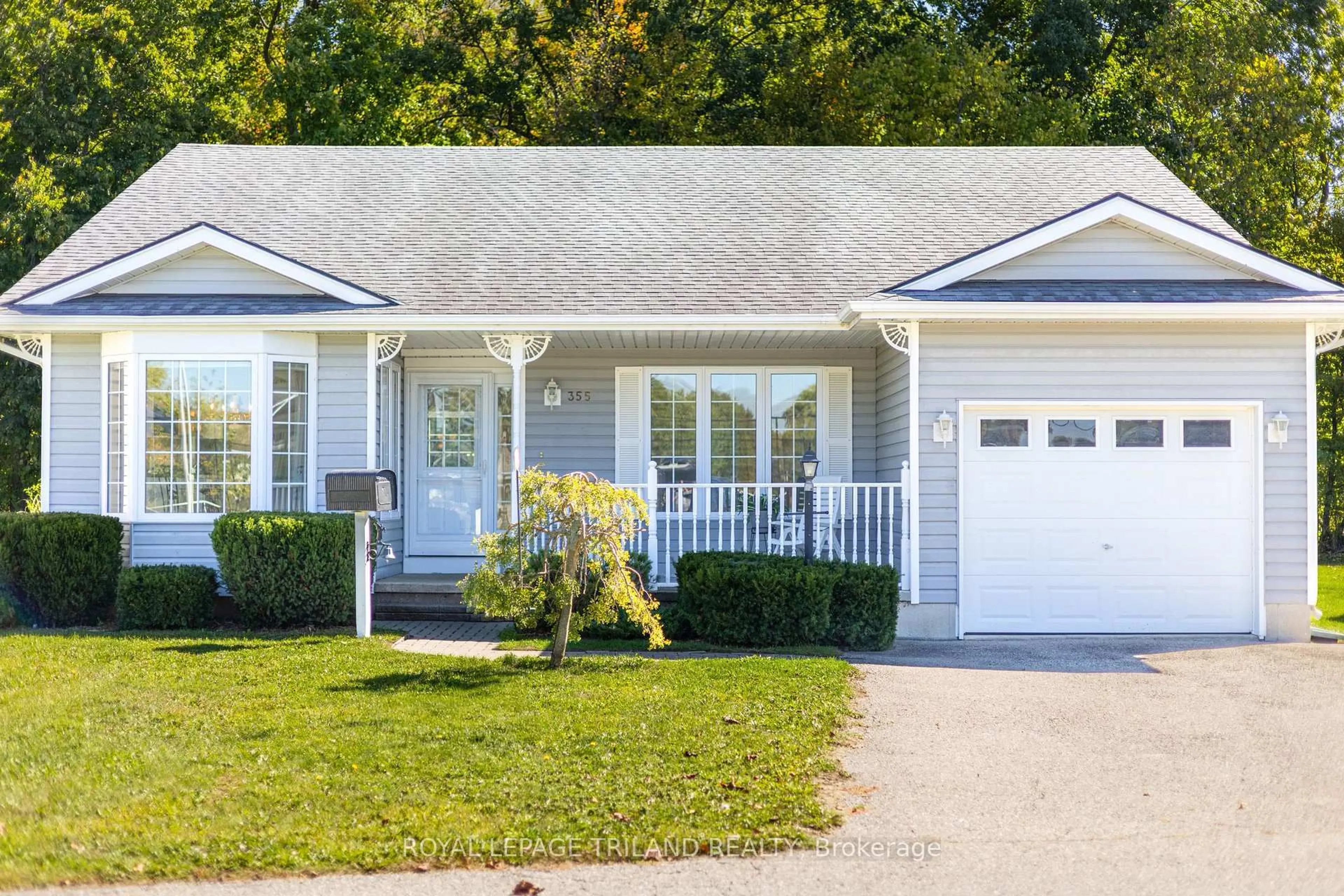 Home with vinyl exterior material, street for 355 Shannon Blvd, South Huron Ontario N0M 1T0