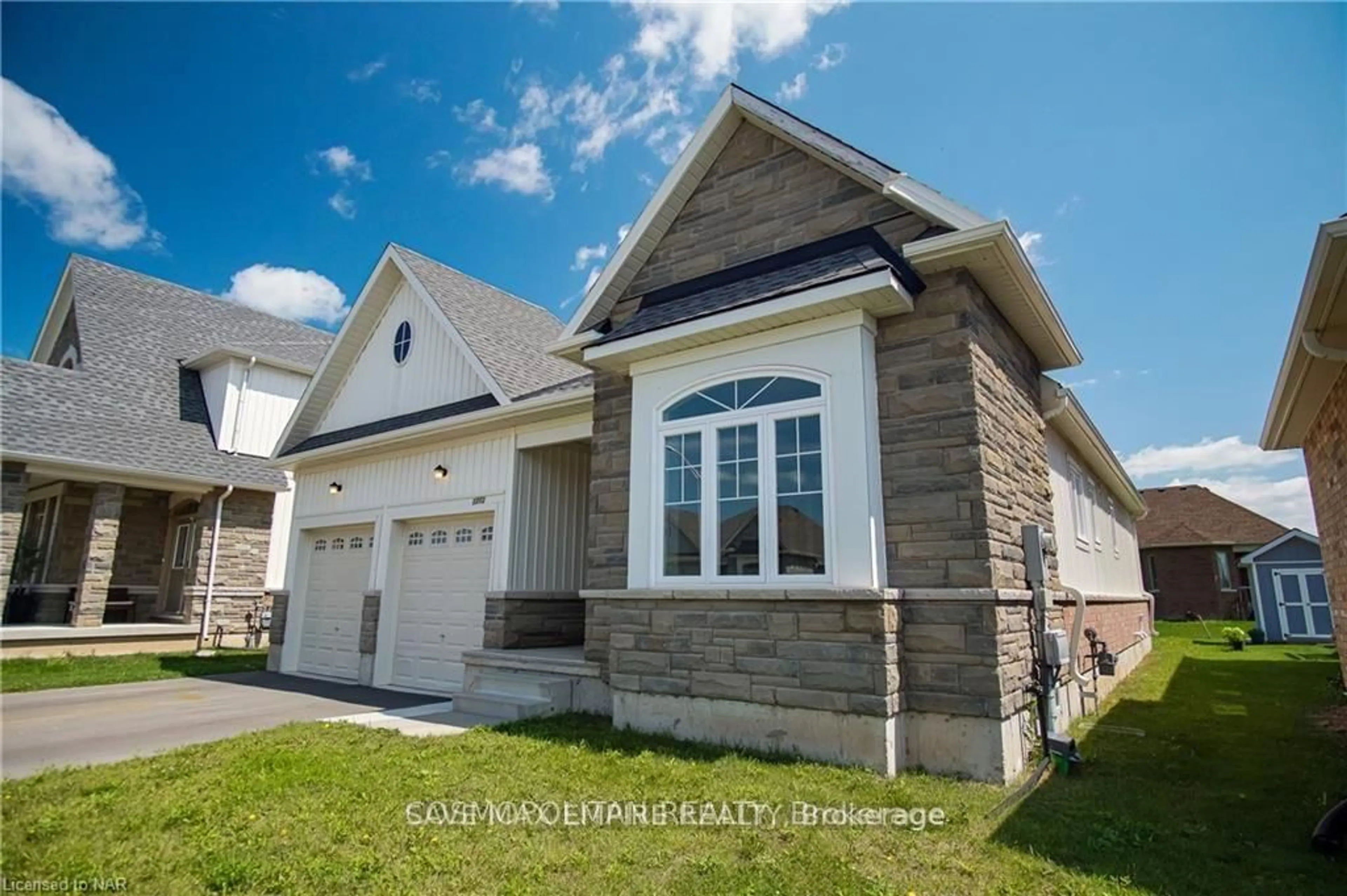 Home with brick exterior material, street for 1202 Green Acres Dr, Fort Erie Ontario L2A 0C9