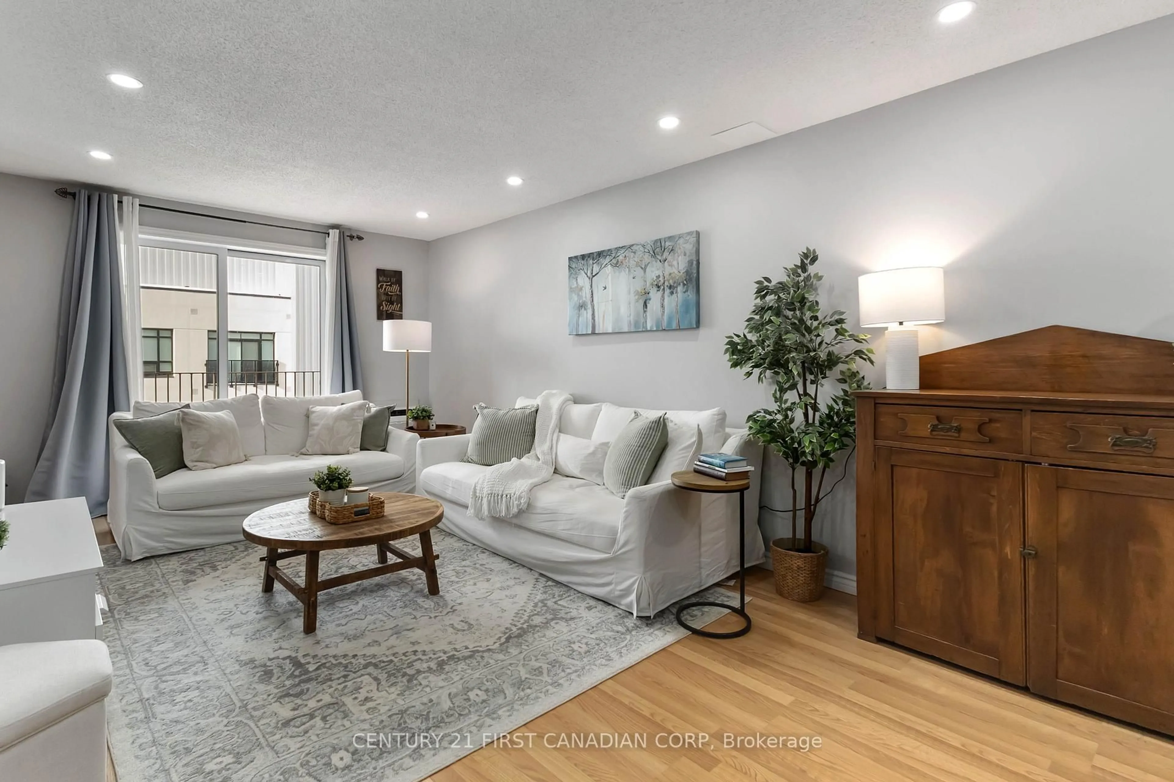 Living room with furniture, unknown for 95 Baseline Rd #1003, London South Ontario N6J 4X3