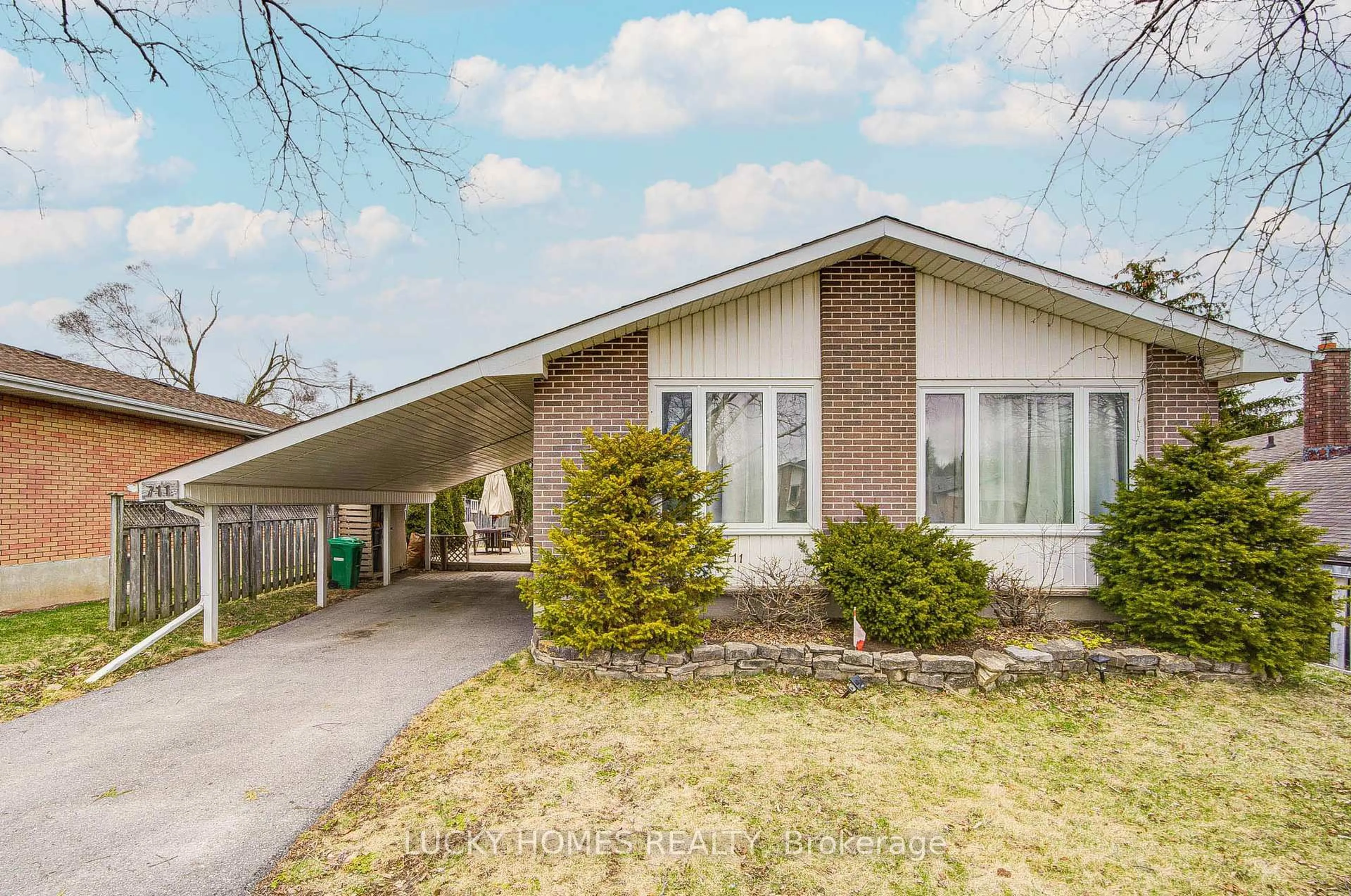 Home with brick exterior material, street for 711 Otonabee Dr, Peterborough Ontario M1B 6B2