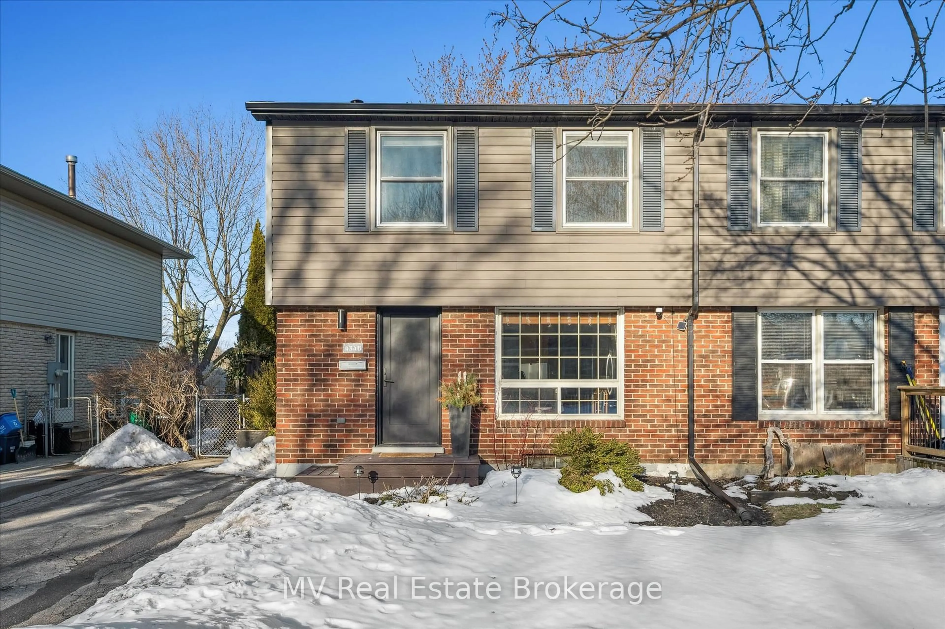 Home with brick exterior material, street for 434B Dunvegan Dr, Waterloo Ontario N2K 2C7