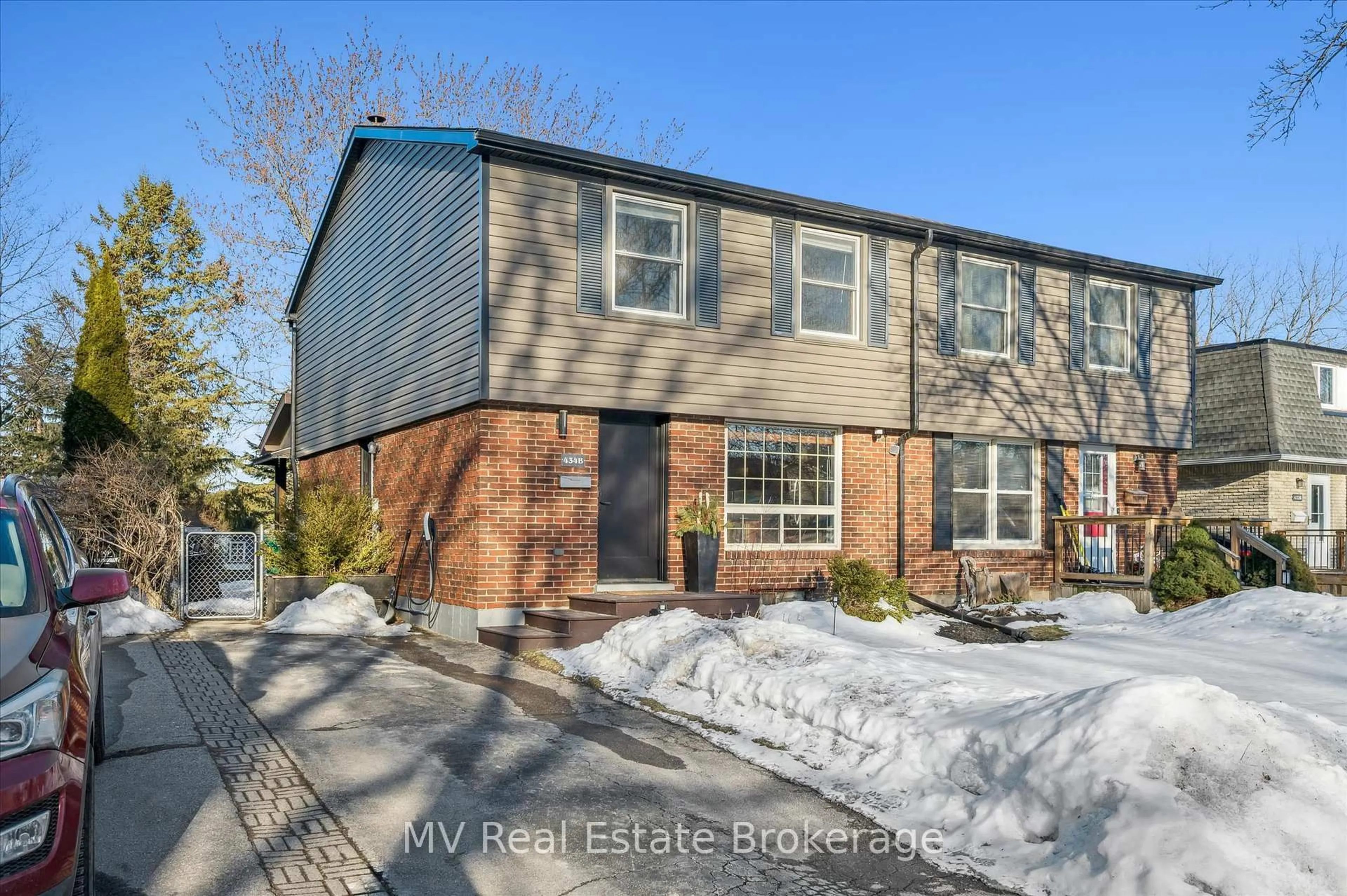 Home with brick exterior material, street for 434B Dunvegan Dr, Waterloo Ontario N2K 2C7