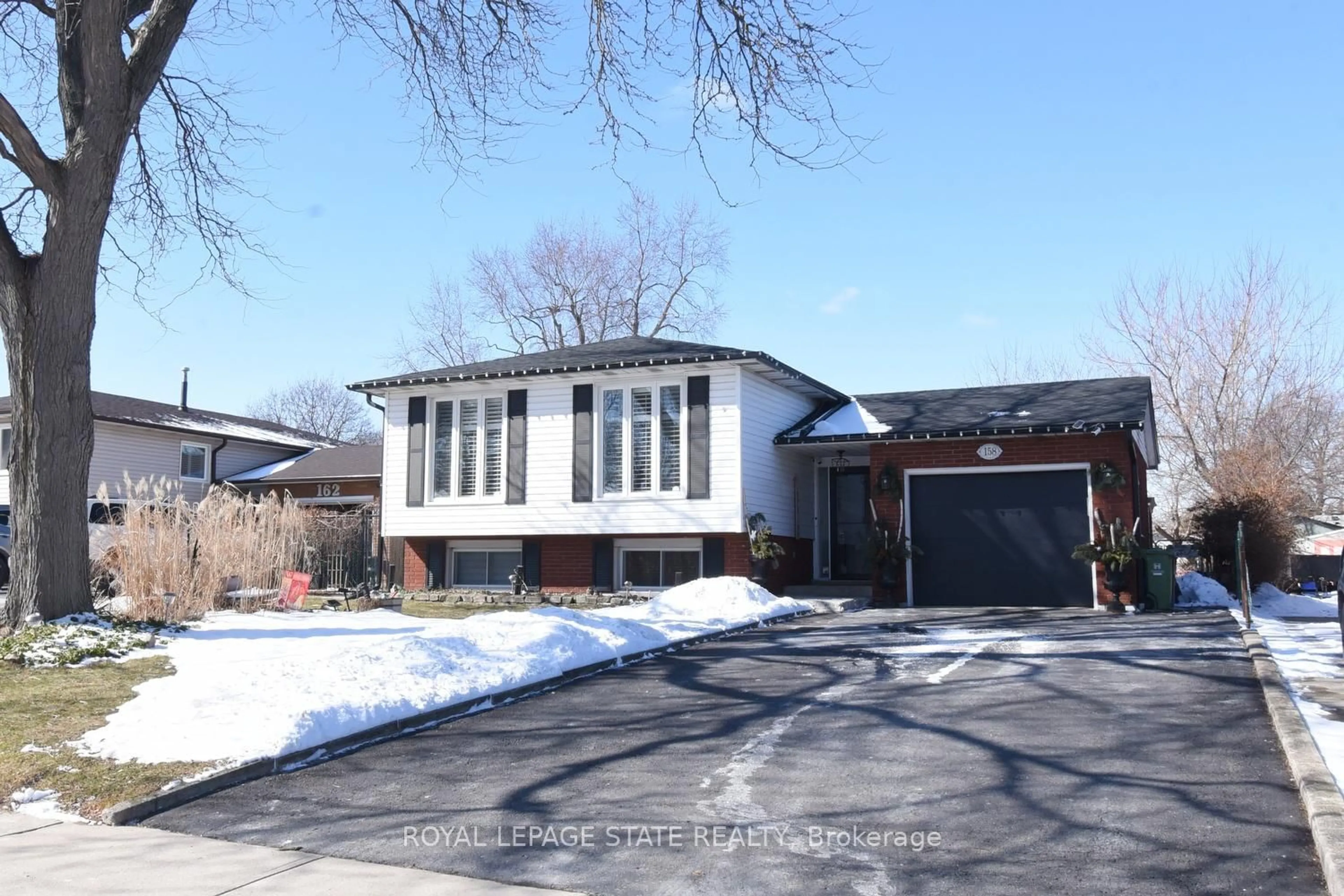 Home with brick exterior material, street for 158 Clifton Downs Rd, Hamilton Ontario L9C 2P6