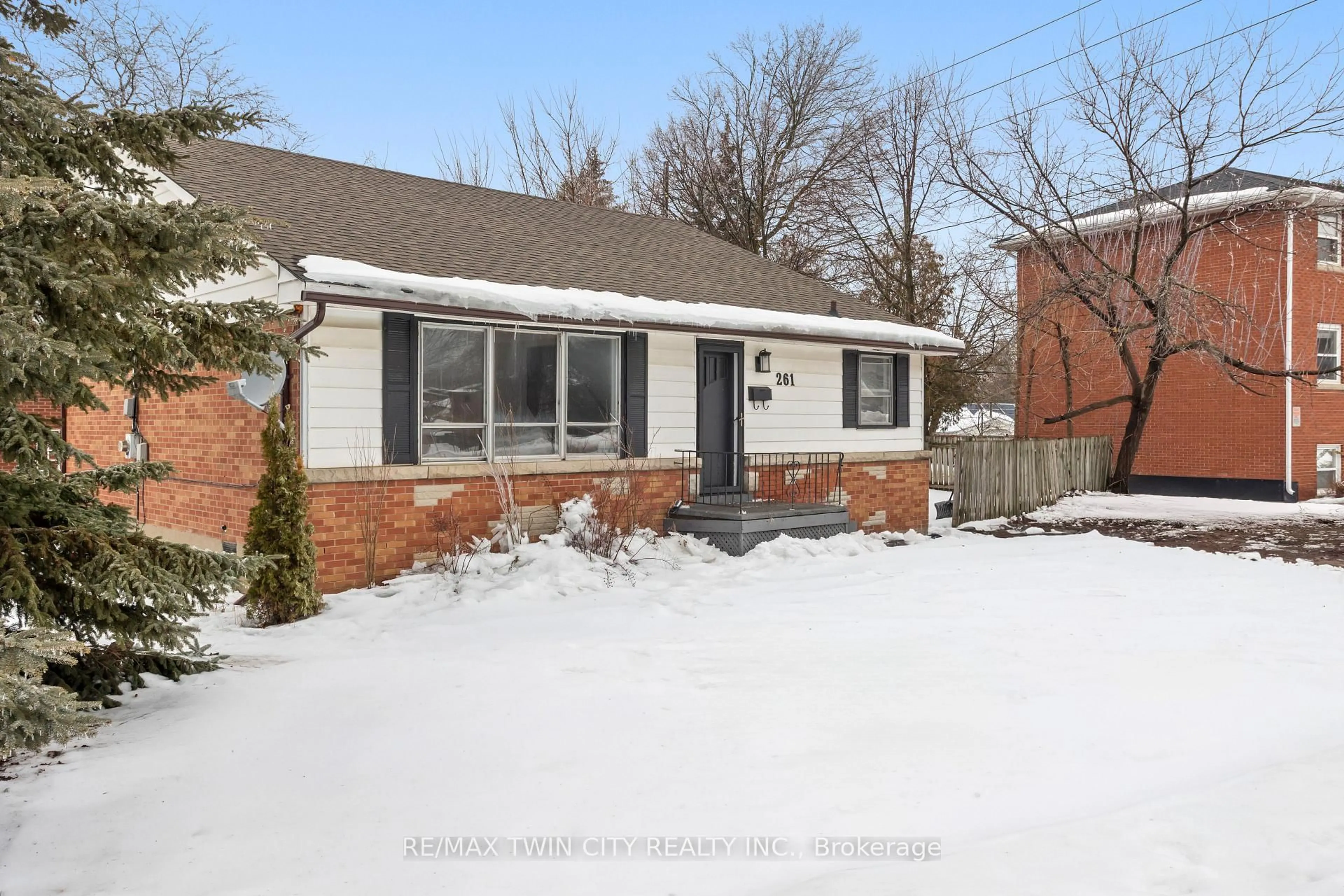 Home with brick exterior material, street for 261 Water St, Guelph Ontario N1G 1B6