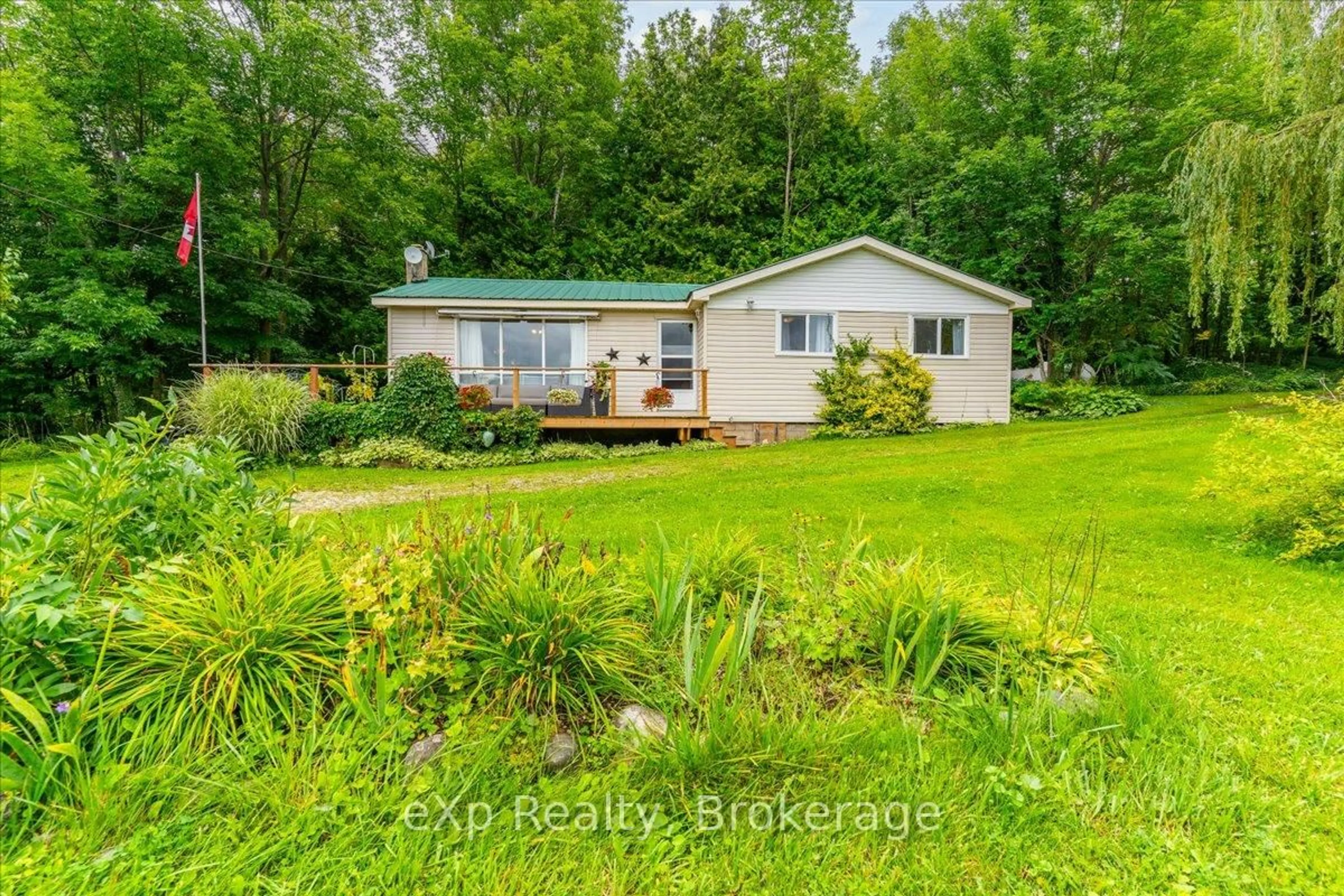 A pic from outside/outdoor area/front of a property/back of a property/a pic from drone, water/lake/river/ocean view for 126 Old Mill Rd, Georgian Bluffs Ontario N0H 2T0