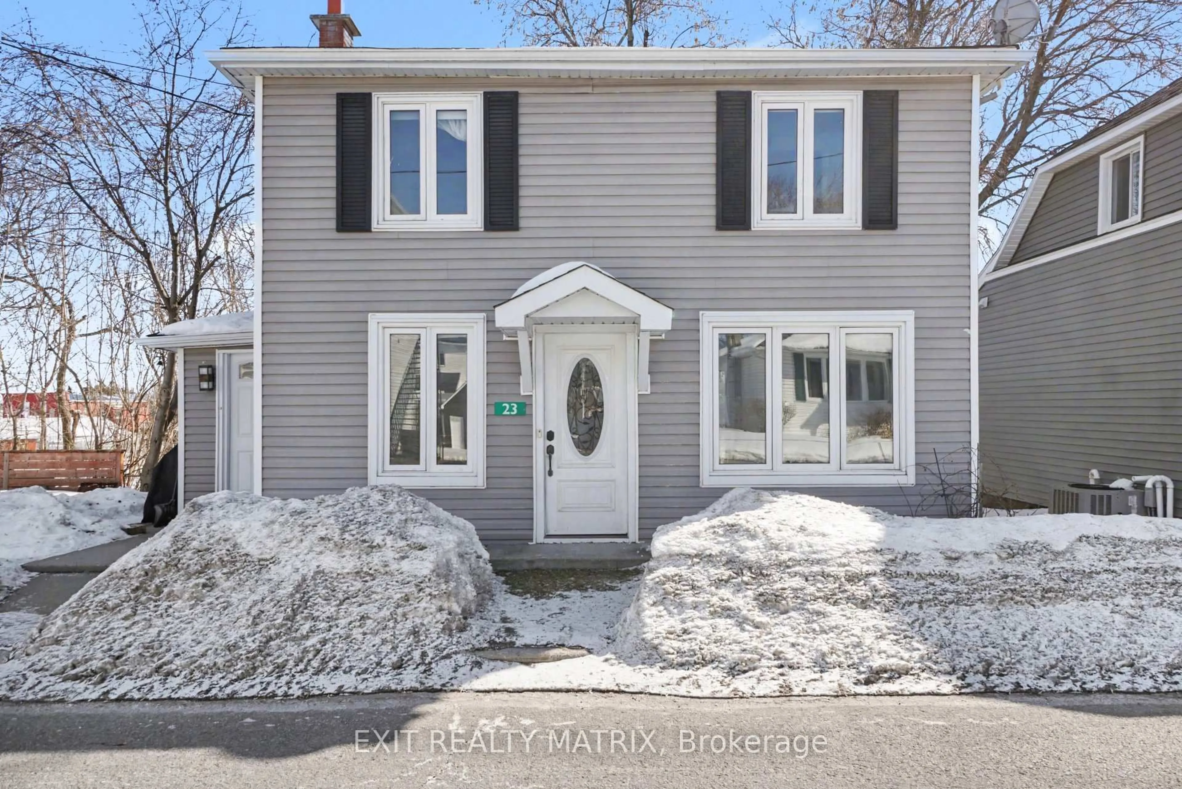 Home with vinyl exterior material, street for 23 Charles St, North Stormont Ontario K0A 1R0