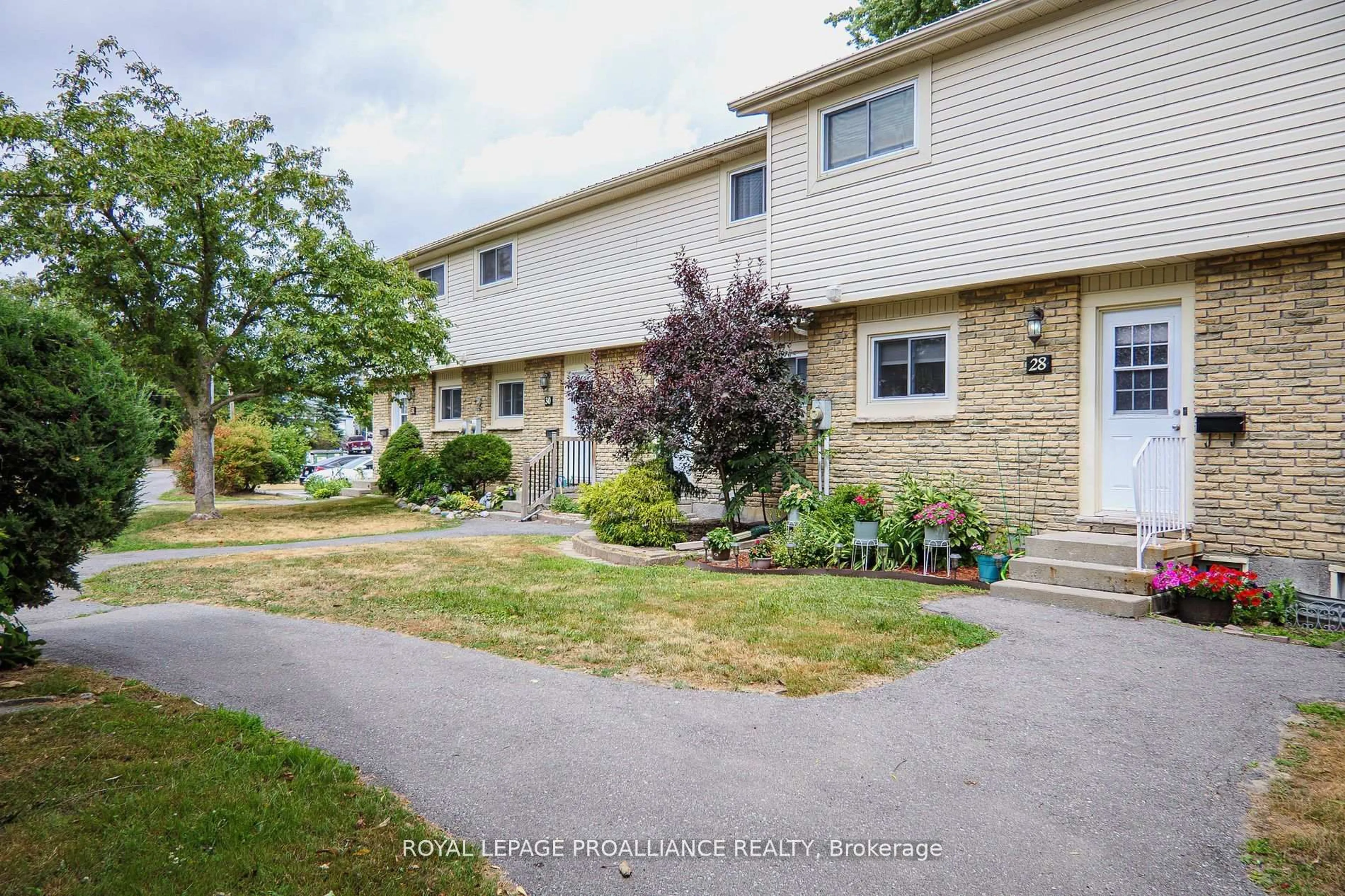 A pic from outside/outdoor area/front of a property/back of a property/a pic from drone, street for 161 Bay St #28, Quinte West Ontario K8V 1H9