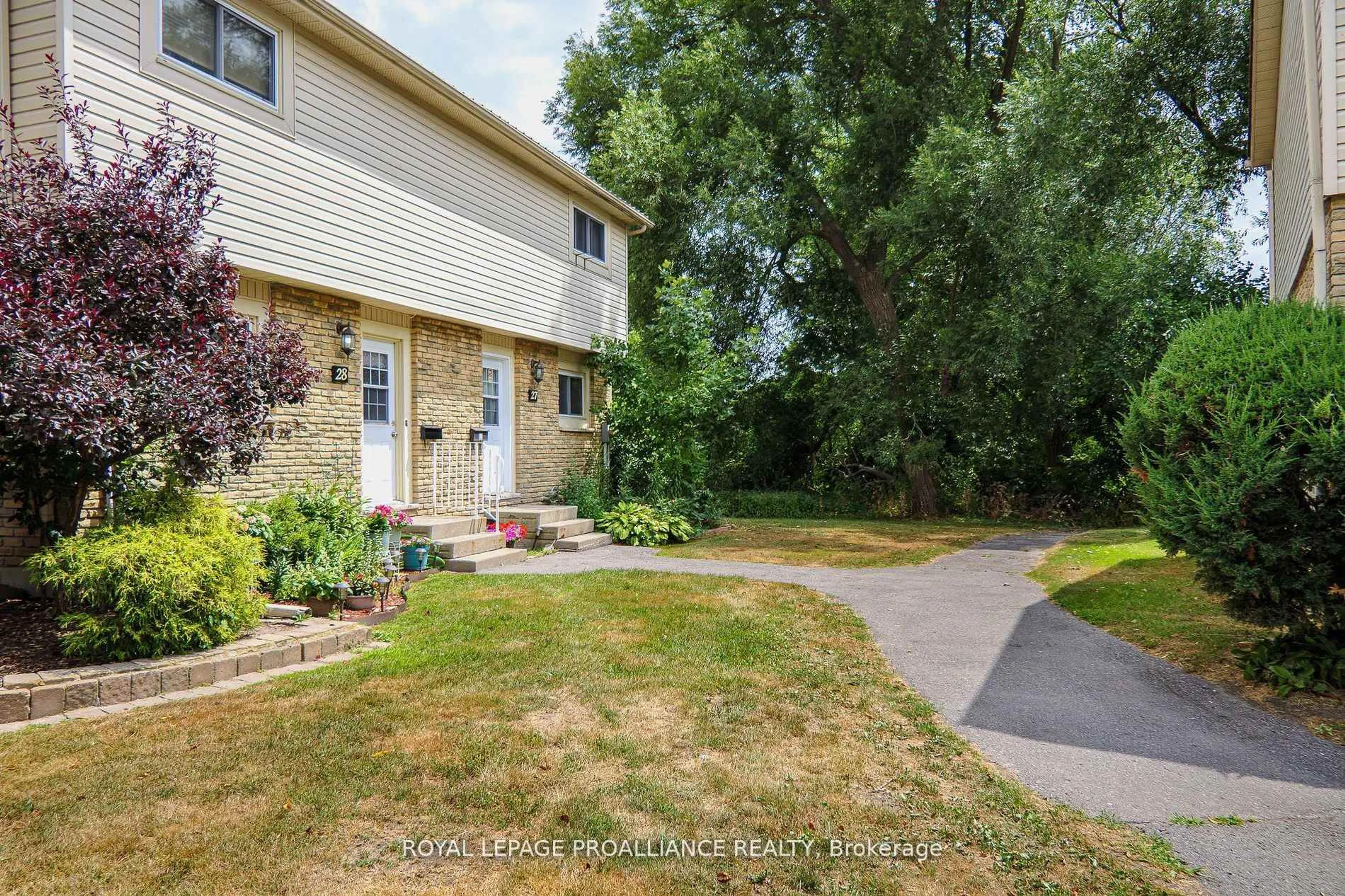 A pic from outside/outdoor area/front of a property/back of a property/a pic from drone, street for 161 Bay St #28, Quinte West Ontario K8V 1H9
