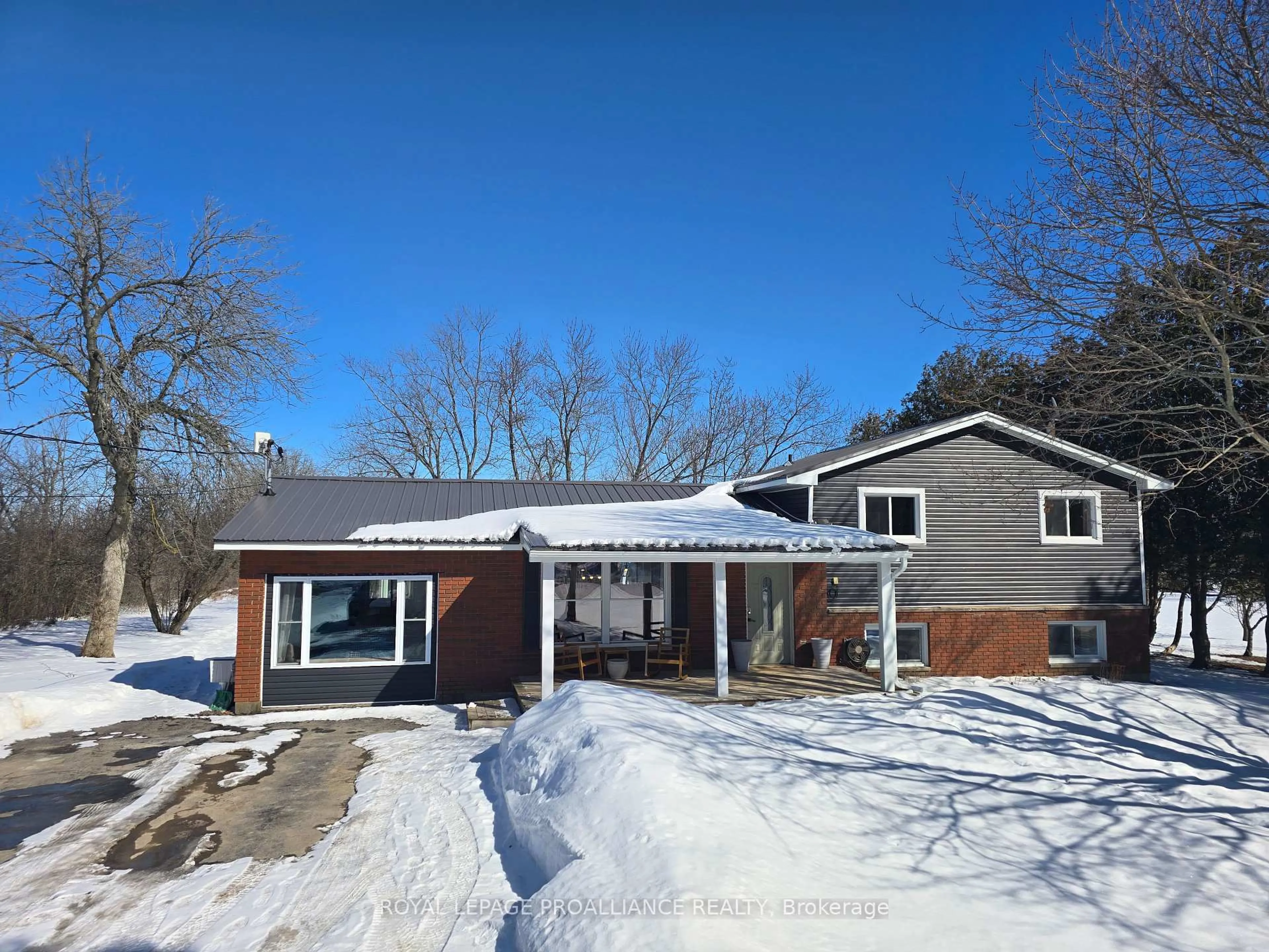 Home with brick exterior material, street for 1099 Wilson Rd, Prince Edward County Ontario K0K 2J0