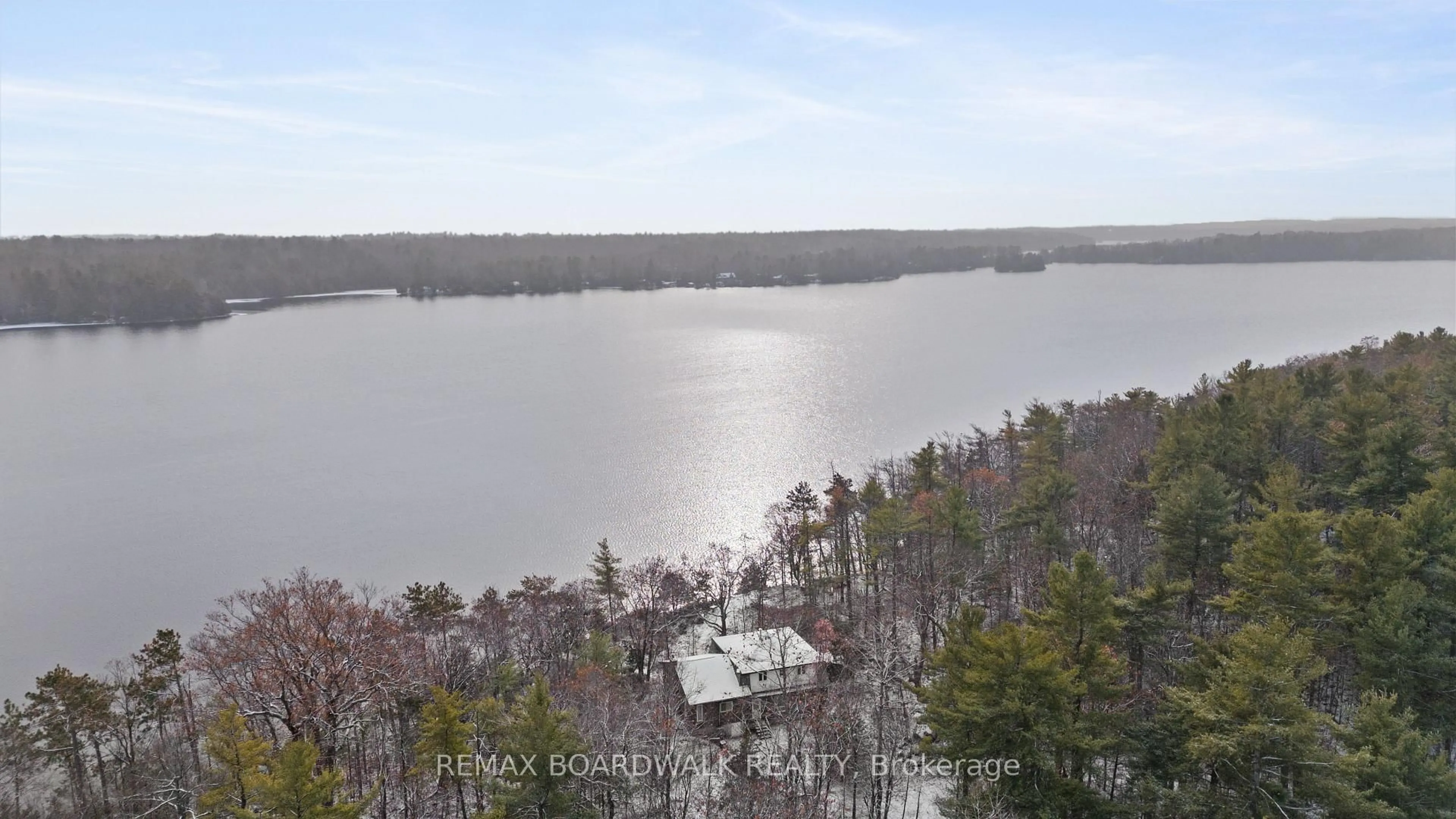 A pic from outside/outdoor area/front of a property/back of a property/a pic from drone, water/lake/river/ocean view for 202 Folly Rd, Rideau Lakes Ontario K0G 1E0