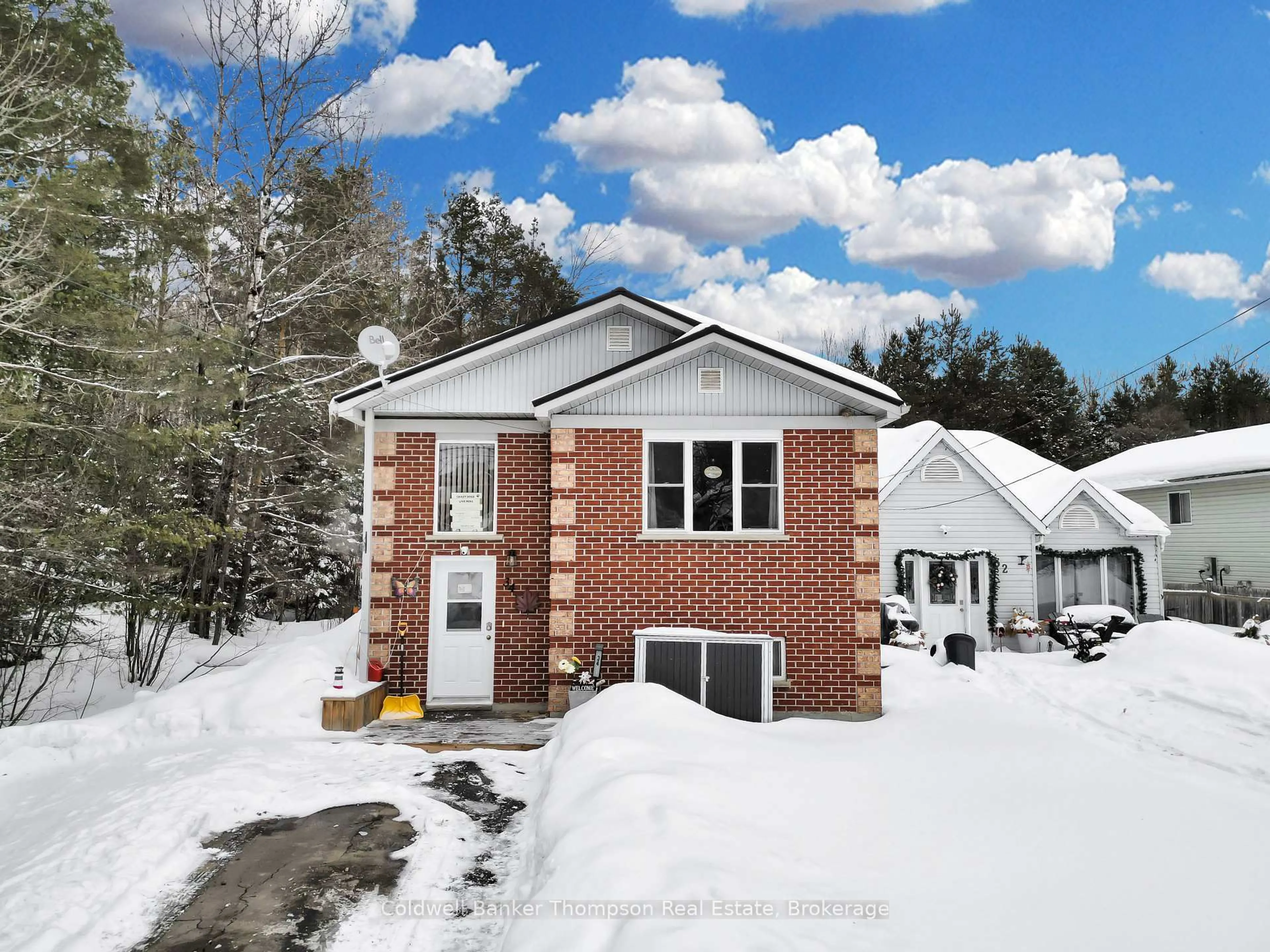 Home with brick exterior material, street for 34 Sabrina Park Dr, Huntsville Ontario P1H 1L8