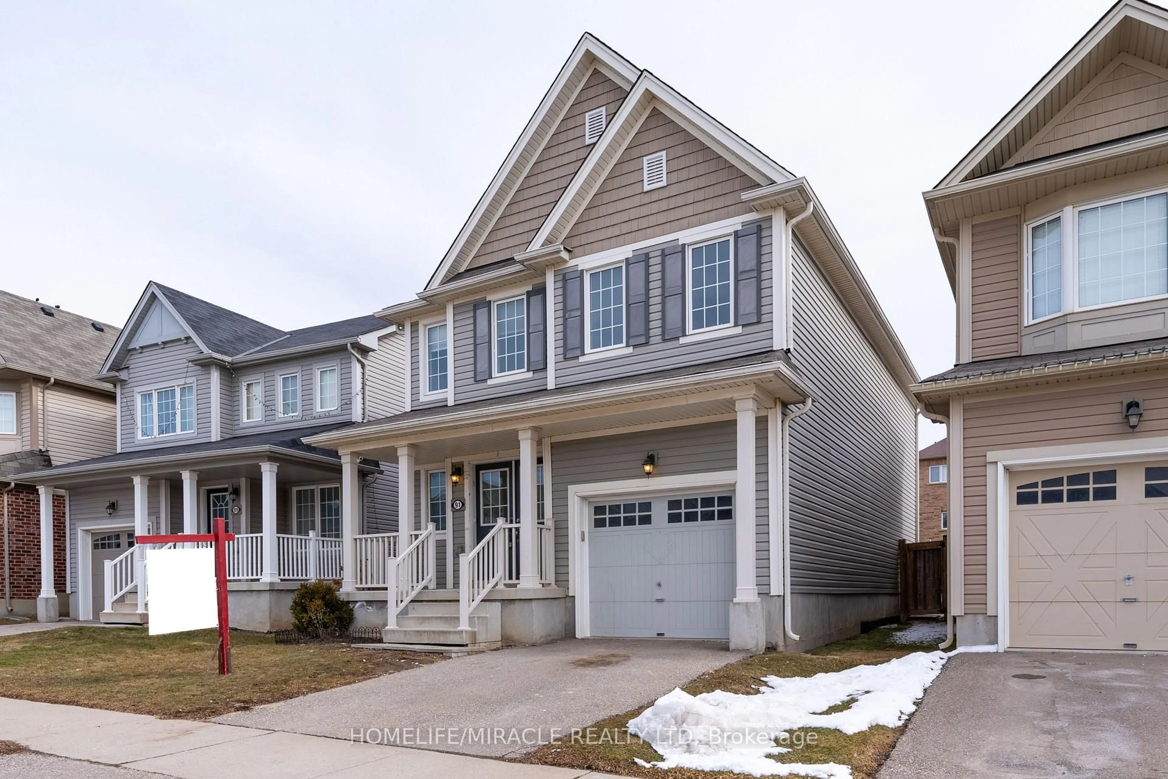 Home with vinyl exterior material, street for 91 Warner Lane, Brantford Ontario N3T 0J4