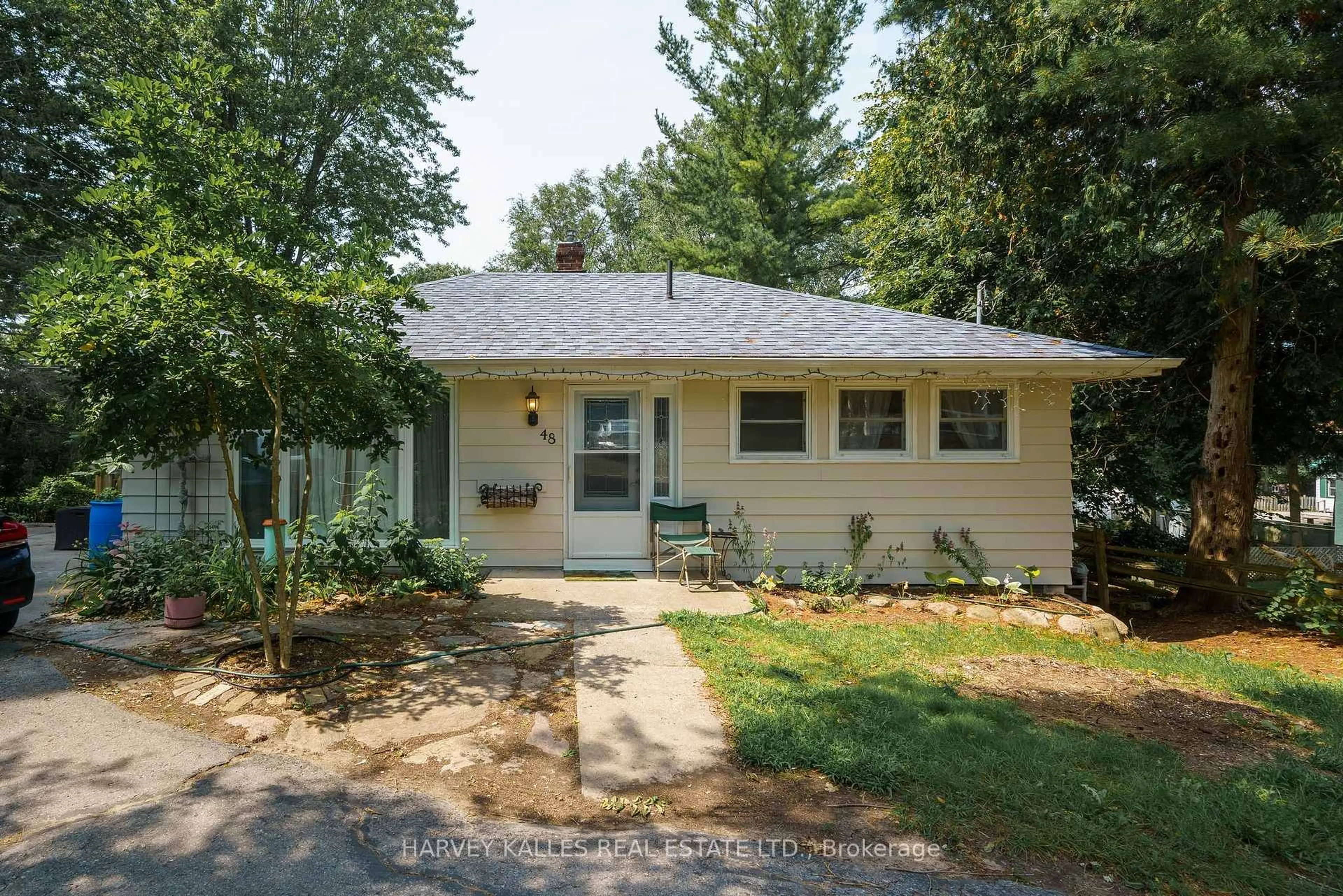 Home with vinyl exterior material, street for 48 Ontario St, Prince Edward County Ontario K0K 2T0