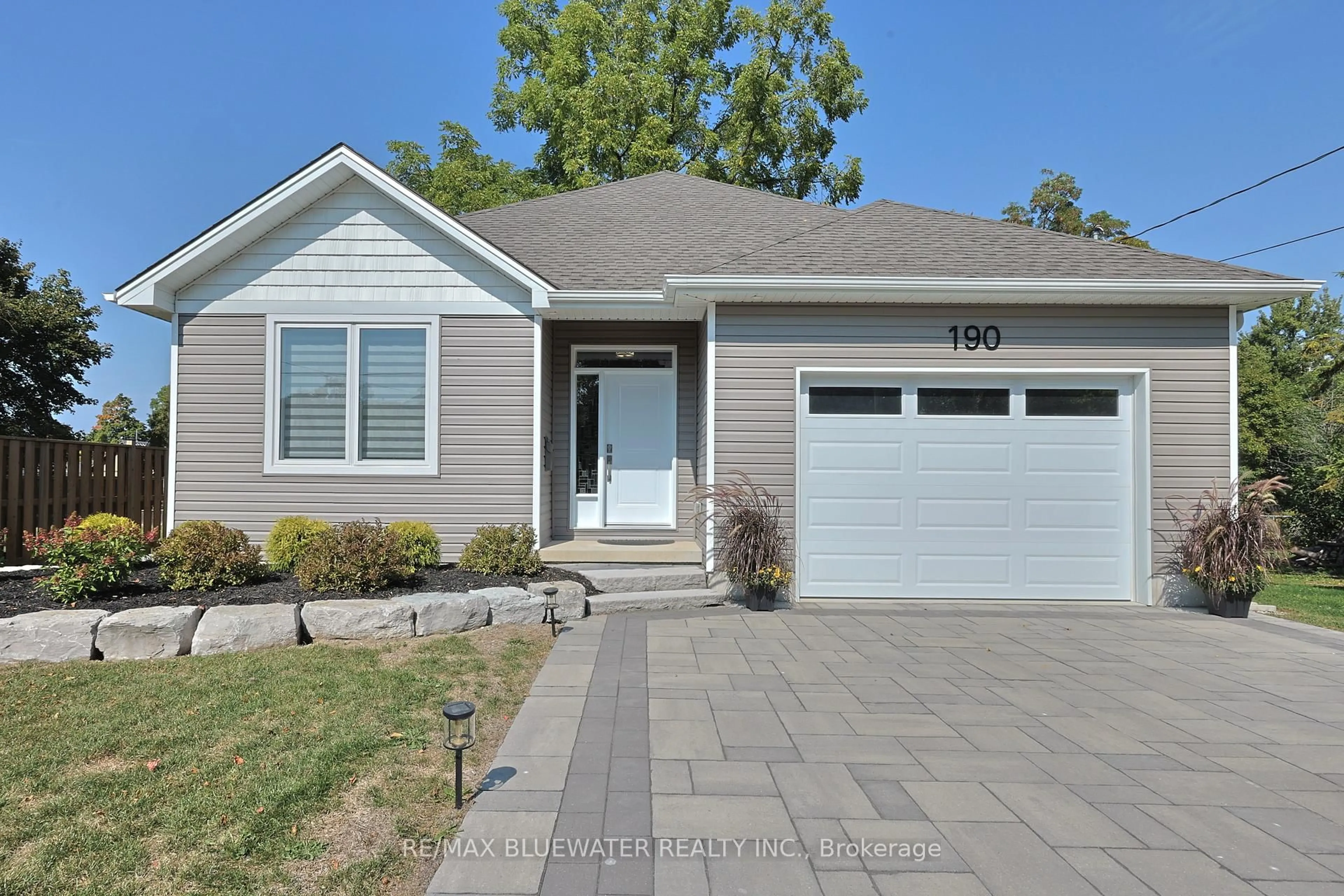 Home with vinyl exterior material, street for 190 Broad St, North Middlesex Ontario N0M 2K0