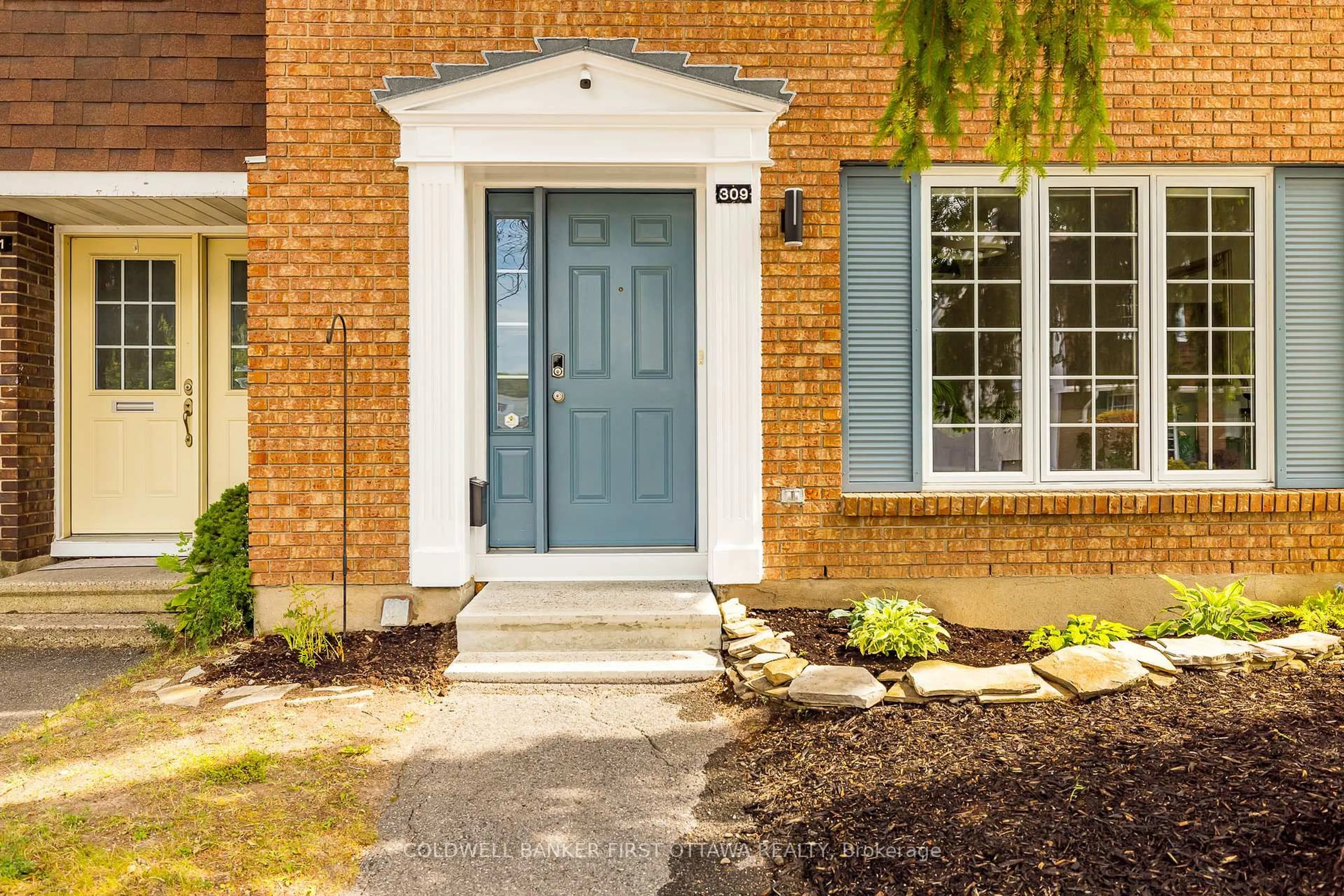 Home with brick exterior material, street for 309 Kintyre Private, Ottawa Ontario K2C 3M6